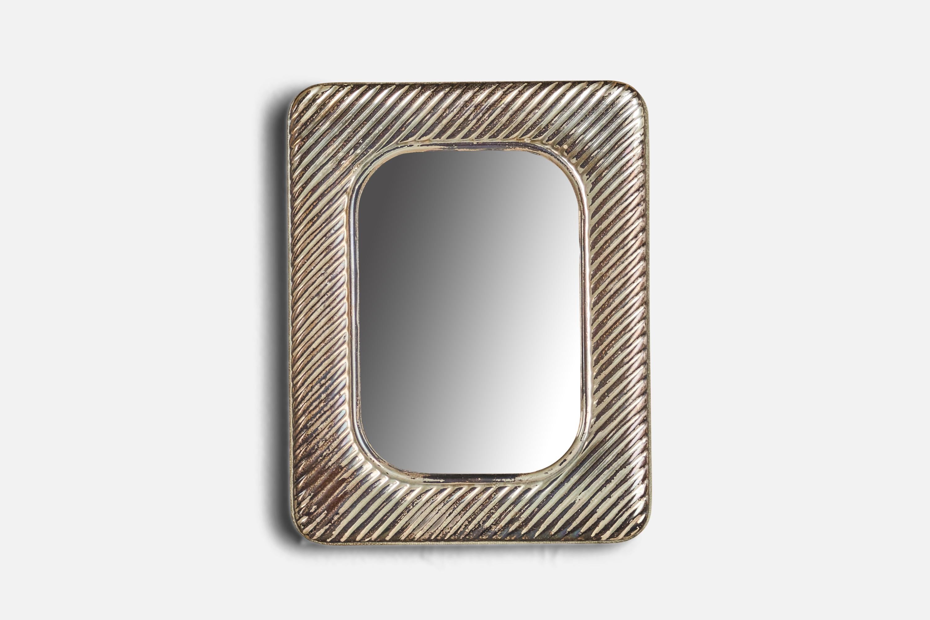 A small sterling silver wall mirror designed and produced in Italy, 1940s.