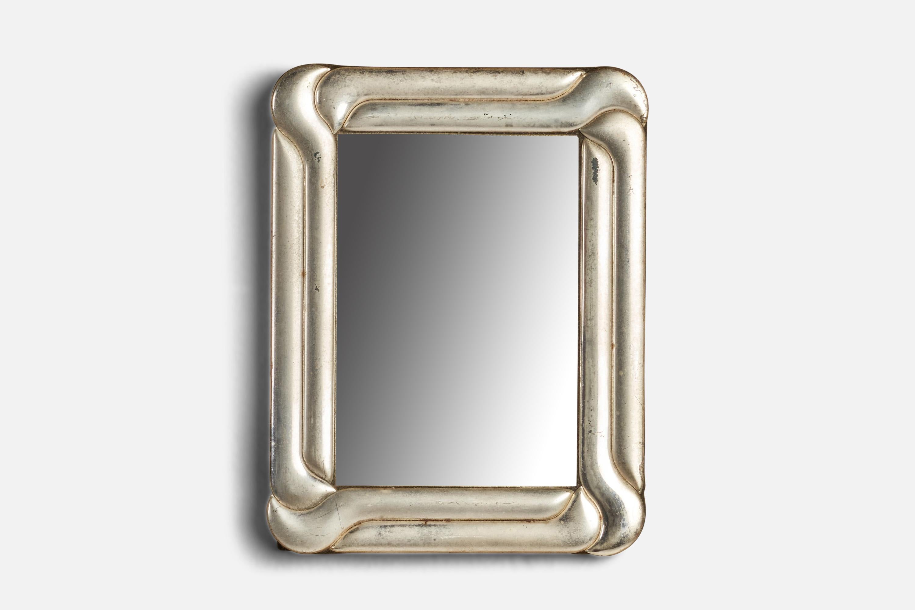 A small sterling silver wall or table mirror designed and produced in Italy, 1930s.