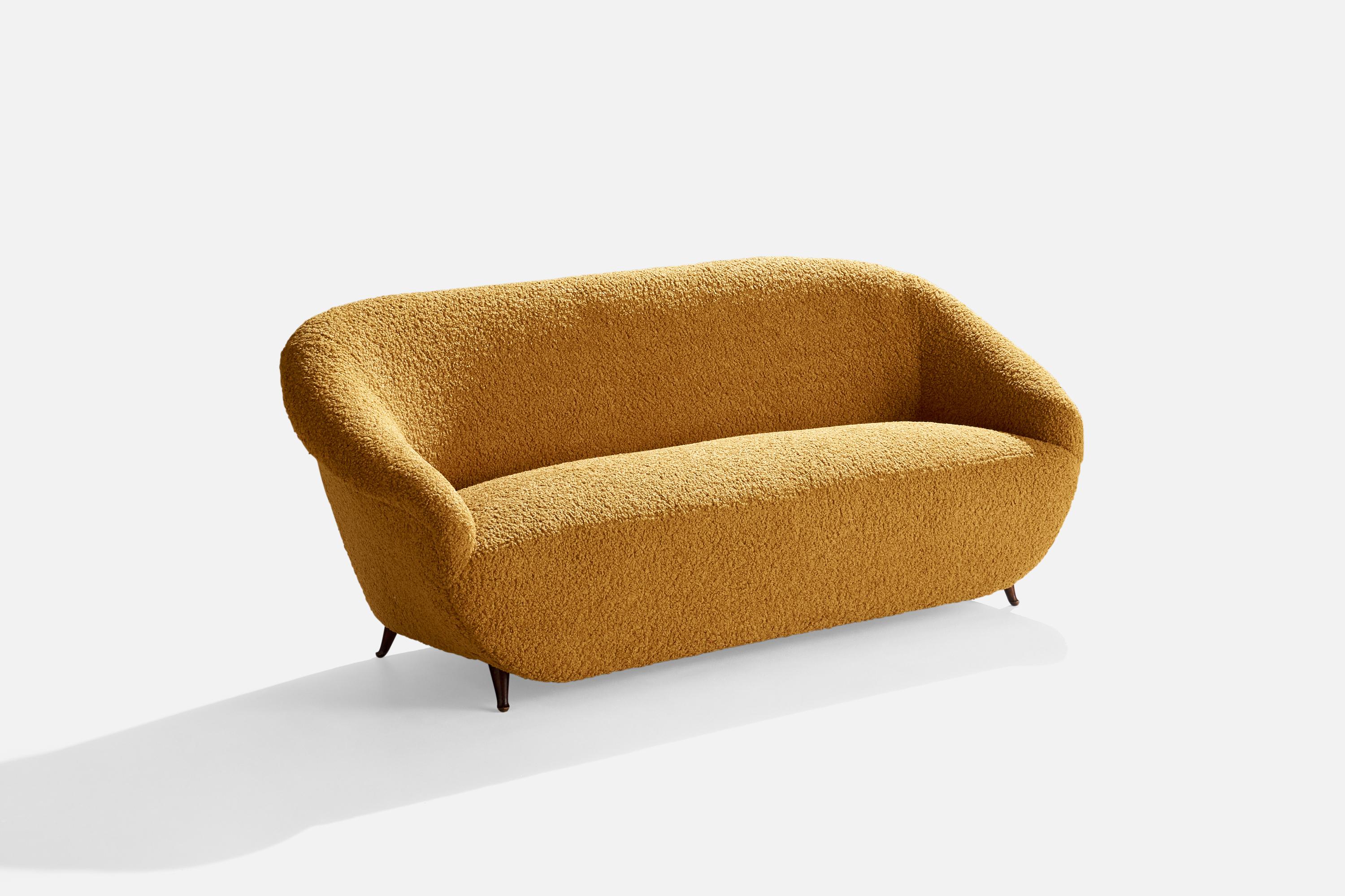 A yellow beige bouclé fabric and wood sofa designed and produced in Italy, c. 1950s.

Seat height 16.5”.
