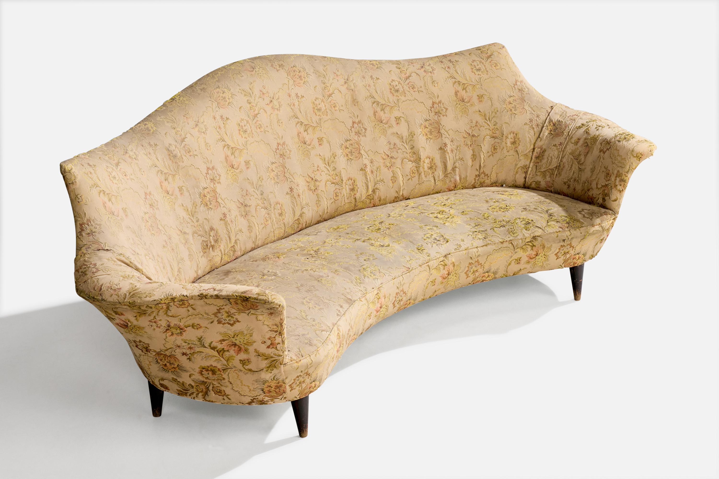 A wood and floral-printed fabric sofa designed and produced in Italy, c. 1940s.

Overall Dimensions (inches): 34.125
