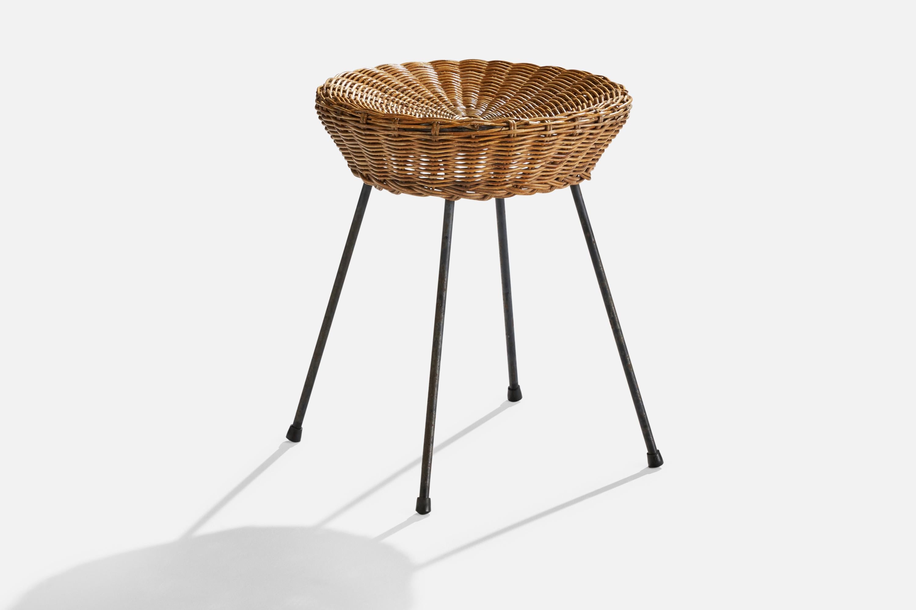A black-lacquered metal and rattan stool designed and produced in Italy, 1950s.

seat height 18” 