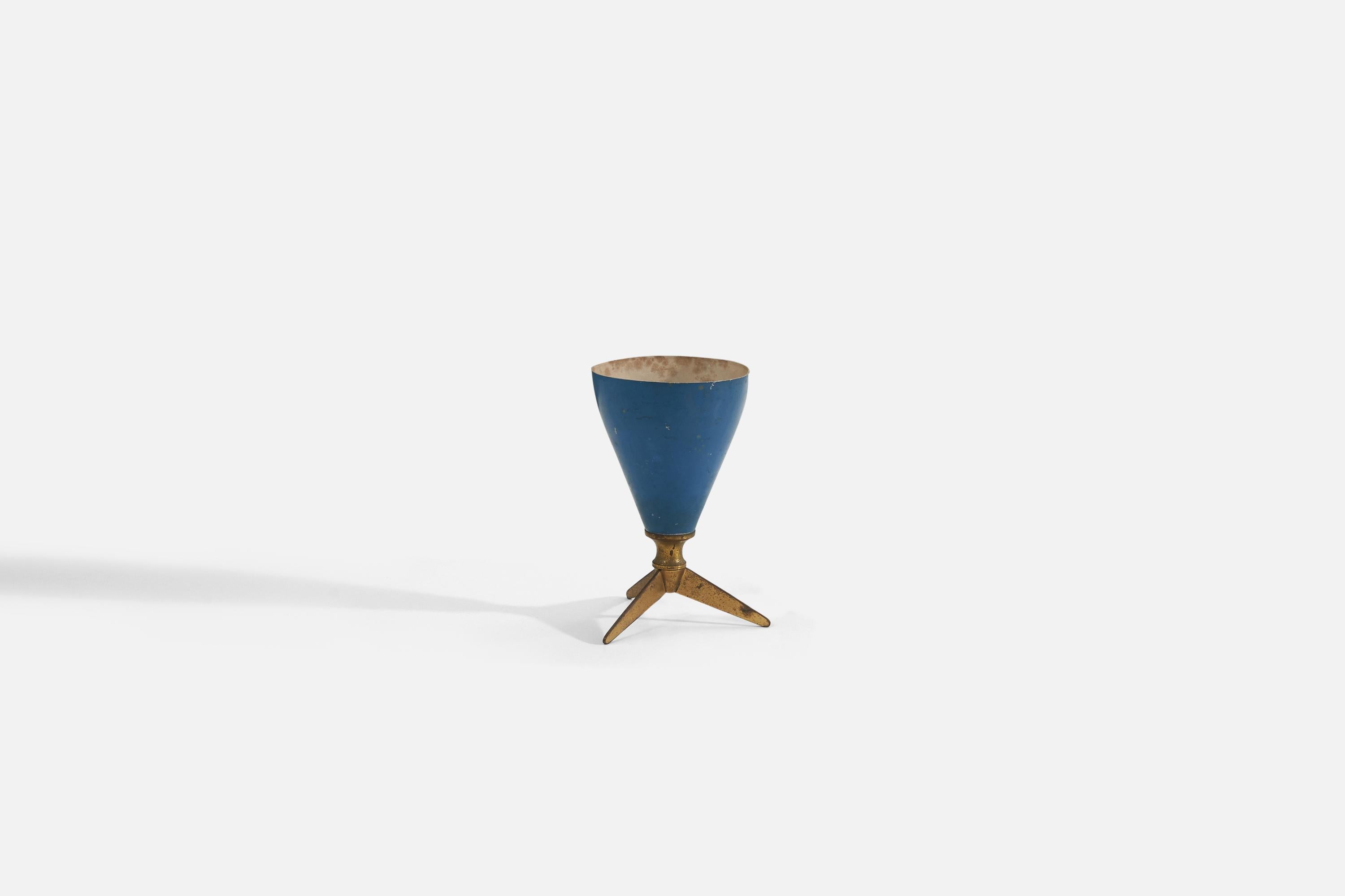 A table lamp designed and produced in Italy 1950s. The lamp features a brass base and a blue-lacquered metal shade.