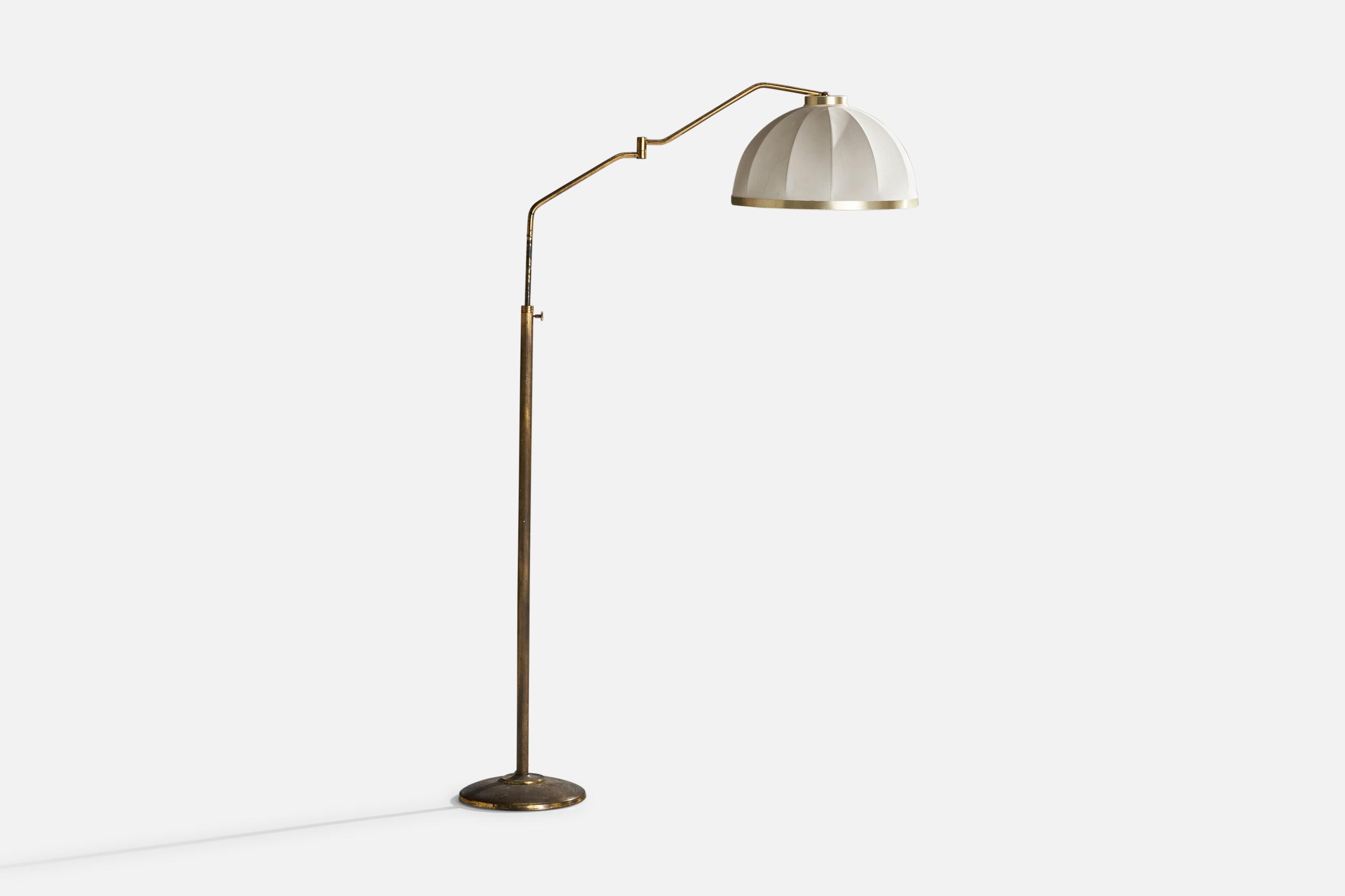 A brass and off-white fabric floor lamp designed and produced in Italy, c. 1940s.

Overall Dimensions (inches): 62” H x 17.8” W x 44.5” D
Dimensions variable based on position of light
Stated dimensions include shade.
Bulb Specifications: E-26