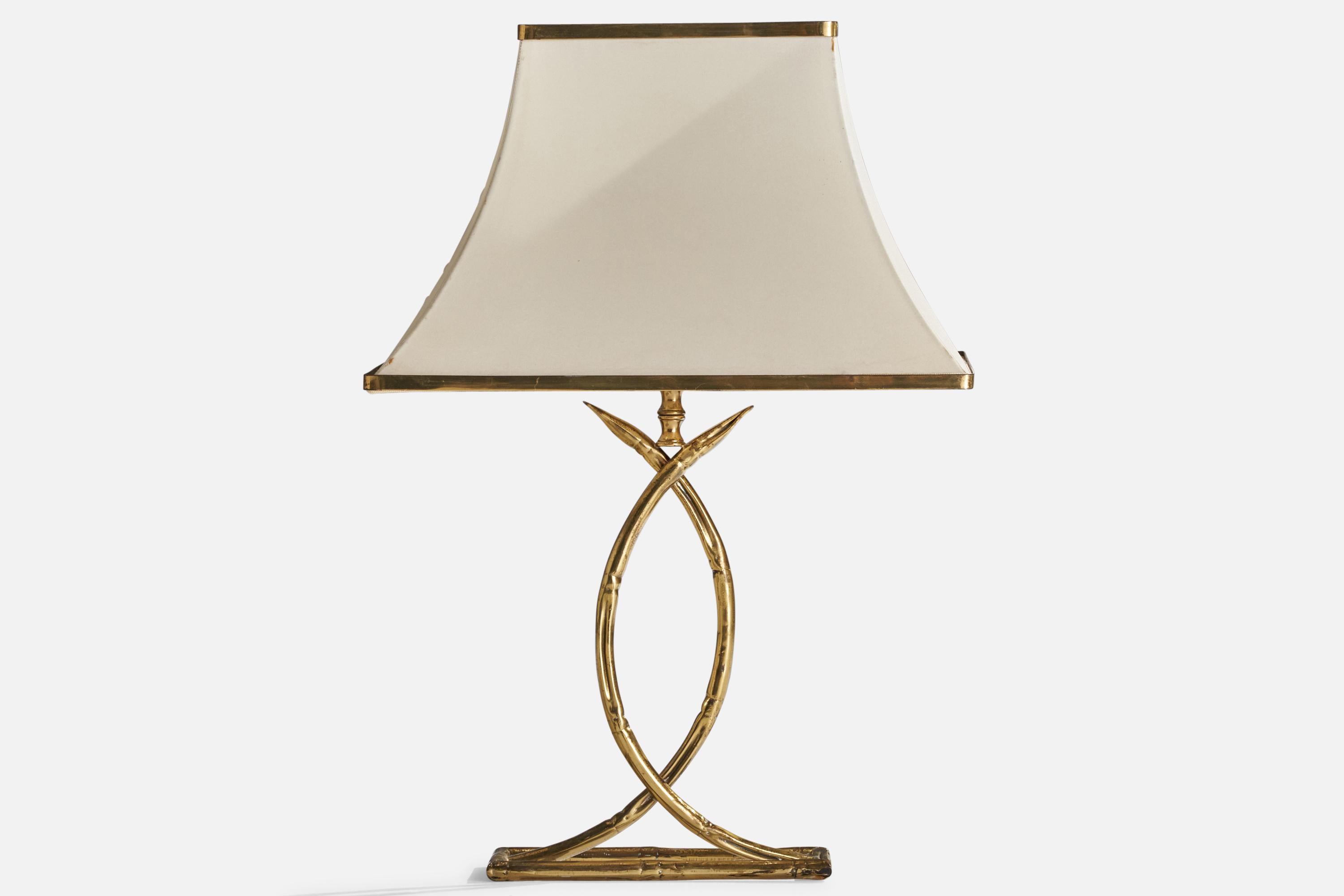 A brass and off-white fabric table lamp designed and produced in Italy, 1970s.

Overall Dimensions (inches): 22” H x 15” W x 9.25” D
Stated dimensions include shade.
Bulb Specifications: E-26 Bulb
Number of Sockets: 1
All lighting will be converted