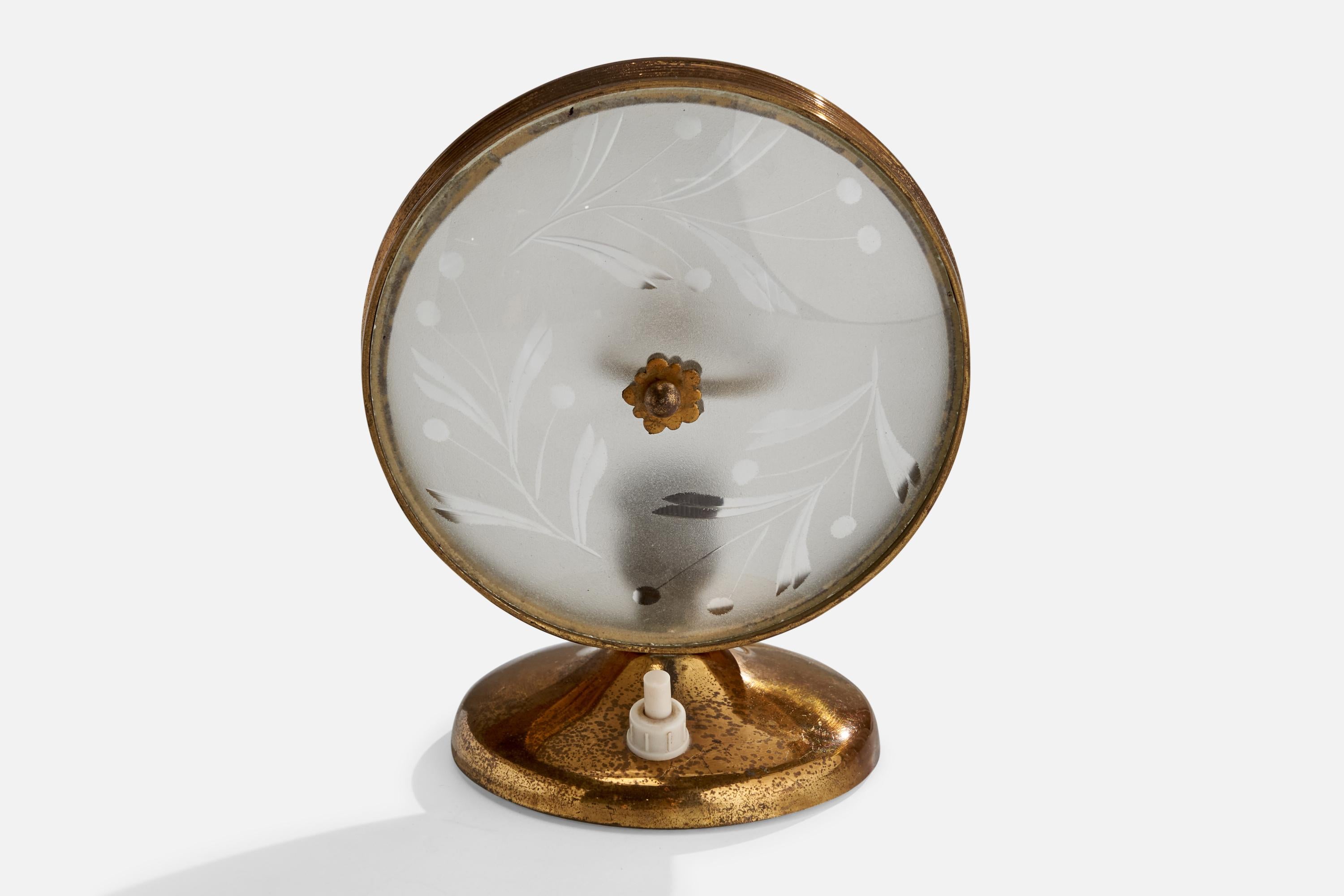 A small brass and glass table lamp designed and produced in Italy, c. 1940s.

Dimensions of Lamp (inches): 6.25” H x 5.75” W x 3.75” D
Bulb Specifications: E-14 Bulbs
Number of Sockets (per fixture): 1
Sold with lampshade.
All lighting will be