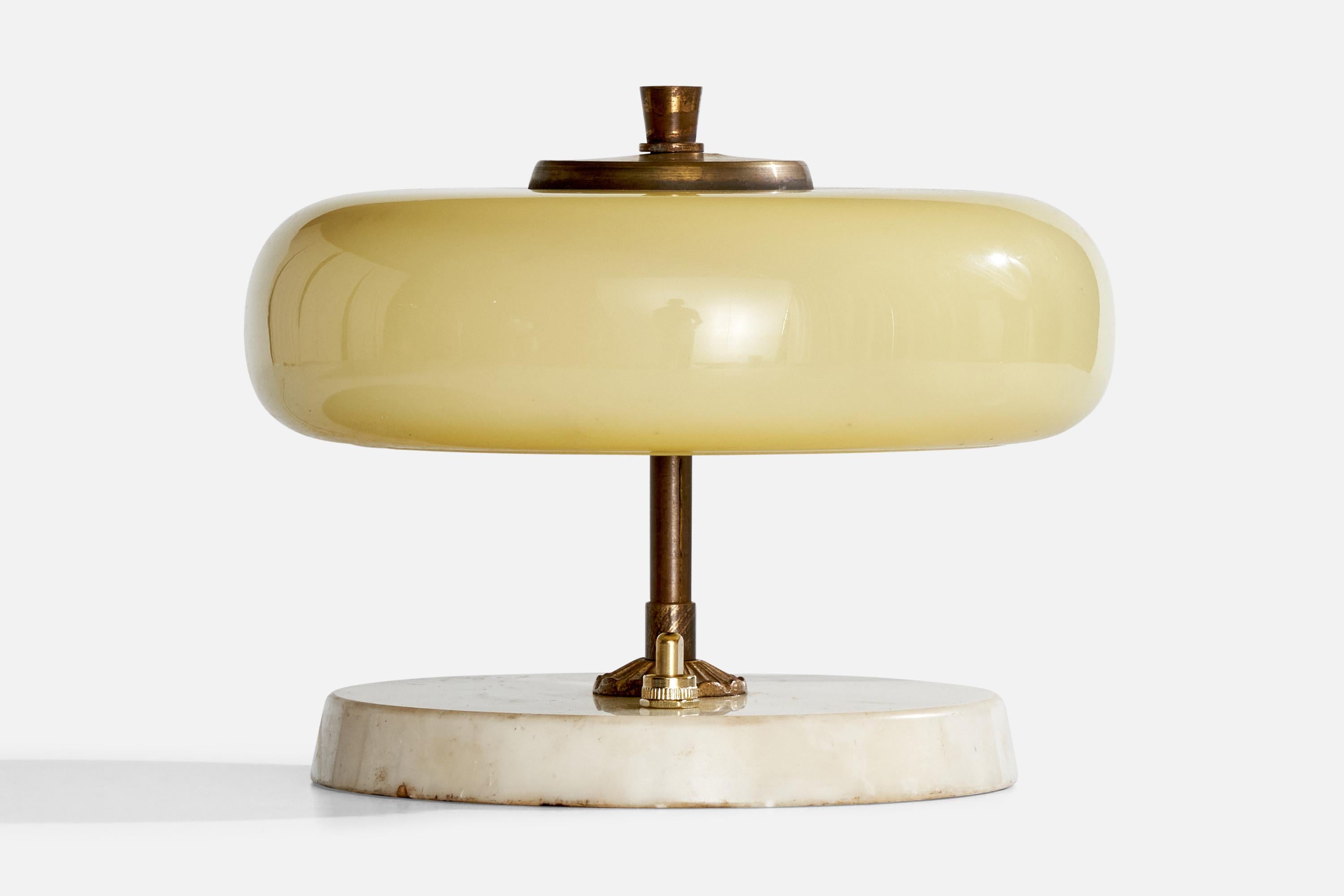 A brass, yellow opaline glass and marble table lamp designed and produced in Italy, c. 1940s.

*a couple scratches and some light discoloration to base

Dimensions of Lamp with Shade (inches): 6” H x 7.75“ Diameter

Bulb Specifications: E-14