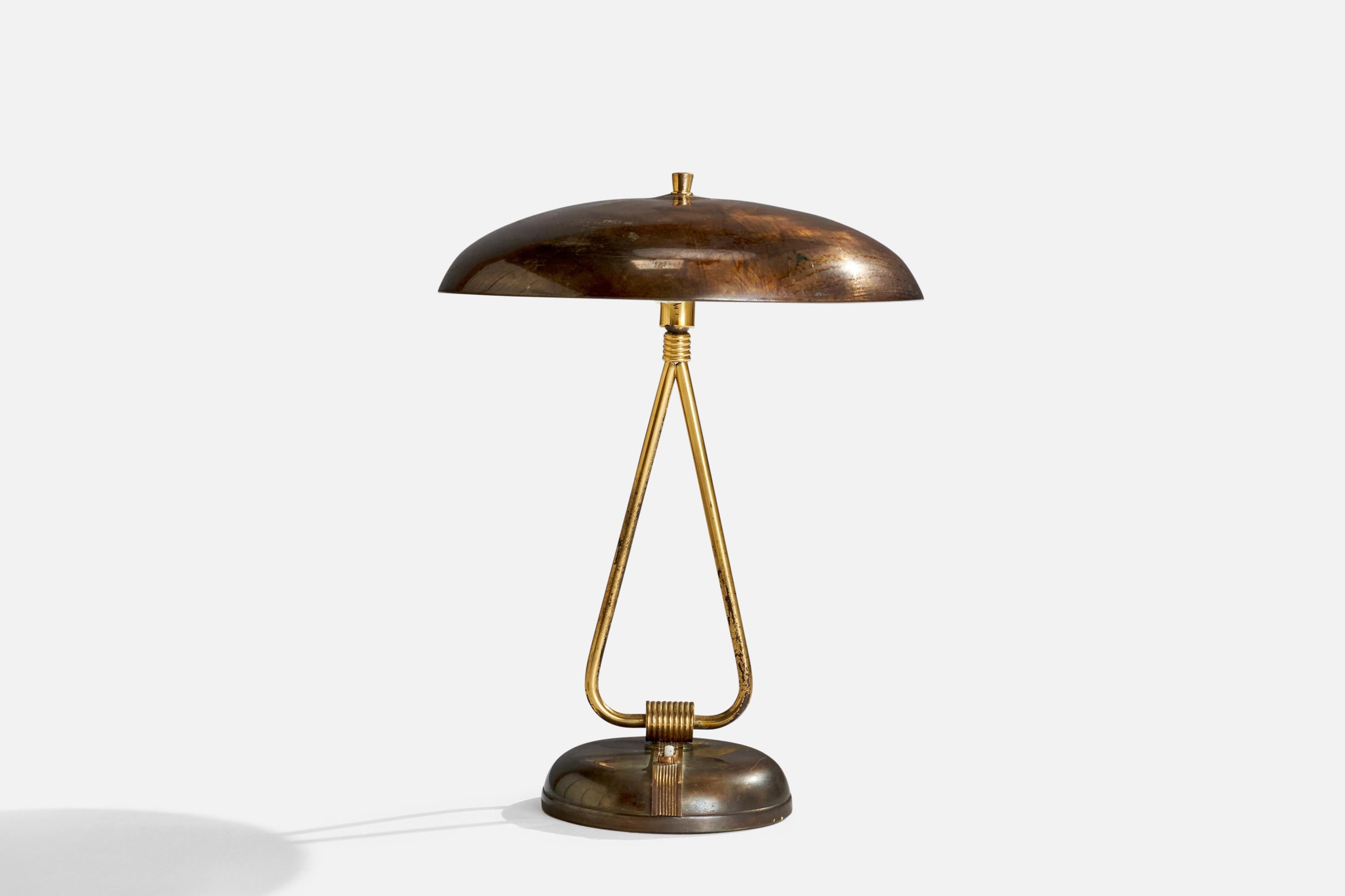 An adjustable brass table lamp designed and produced in Italy, 1940s.

Overall Dimensions (inches): 17” H x 12.5” Diameter
Bulb Specifications: E-14 Bulbs
Number of Sockets: 2
All lighting will be converted for US usage. We are unable to confirm