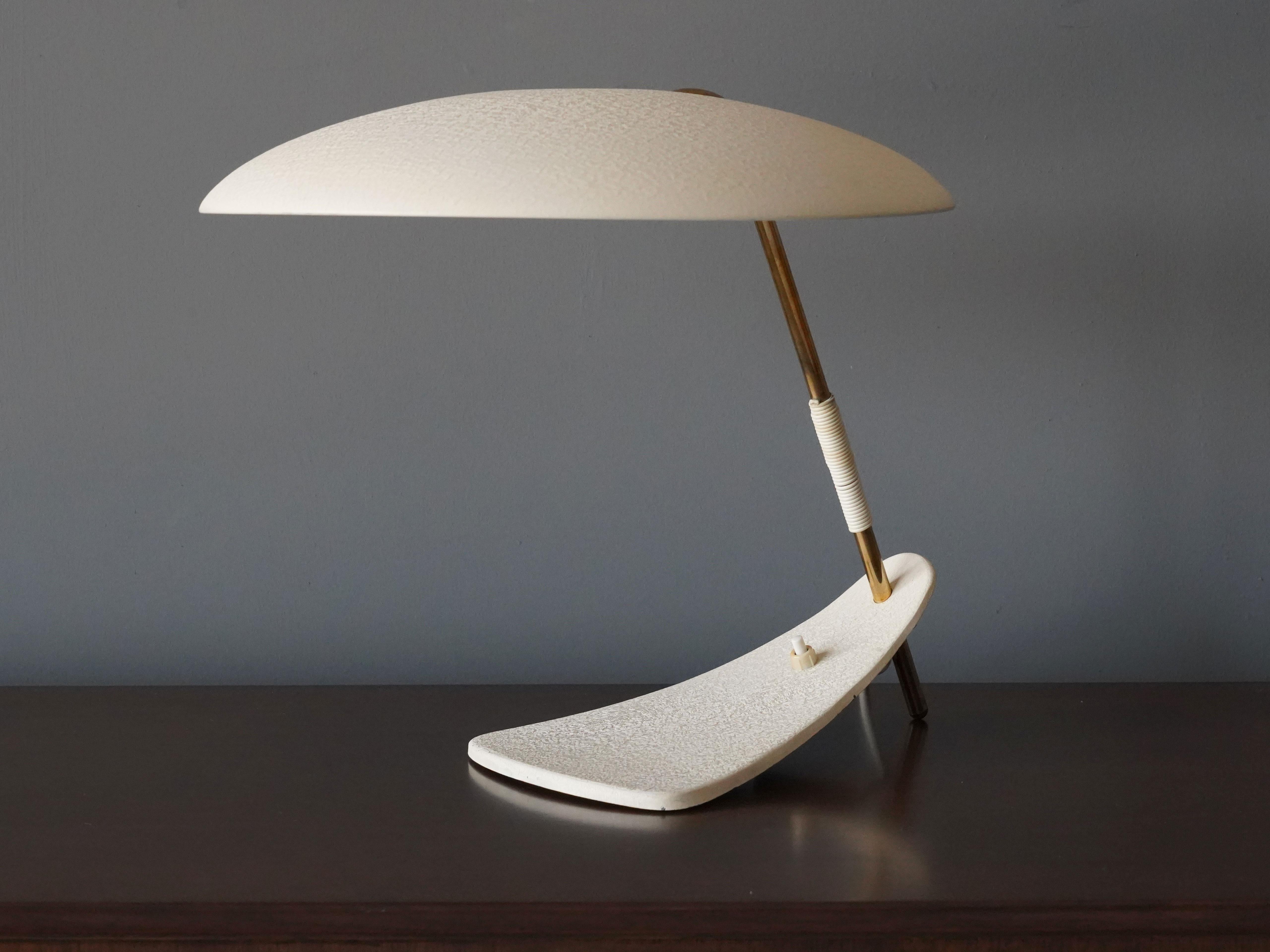 A highly modernist table lamp / desk light. Produced by an unknown designer, Italy, 1960s.

Other designers of the period designing in a similar visual language include Serge Mouille, Angelo Lelii, Max Ingrand, Gino Sarfatti, and Achille