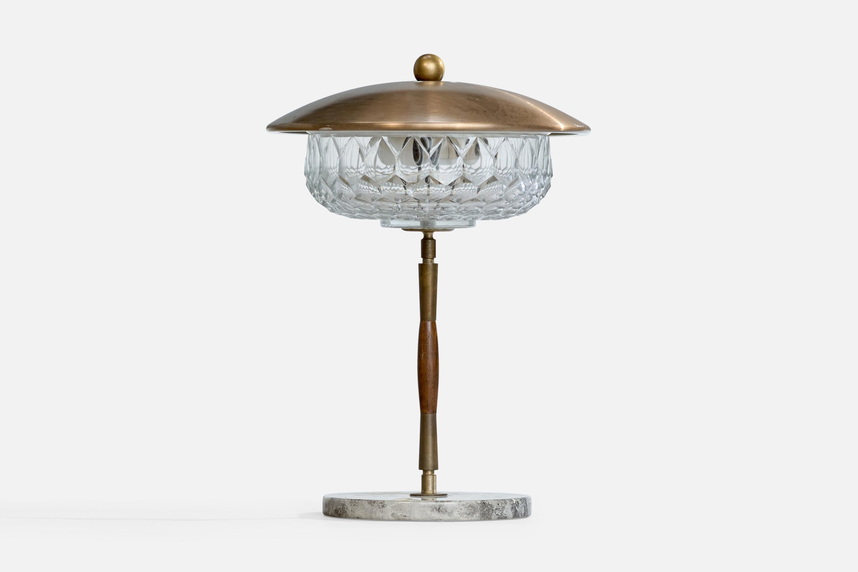 A brass, glass, wood and marble table lamp designed and produced in Italy, c. 1950s.

Dimensions of Lamp with Shade (inches): 18.75“ H x 13.5“ Diameter

Bulb Specifications: E-26 Bulb

Number of Sockets (per fixture): 2

Sold with lampshade.

All