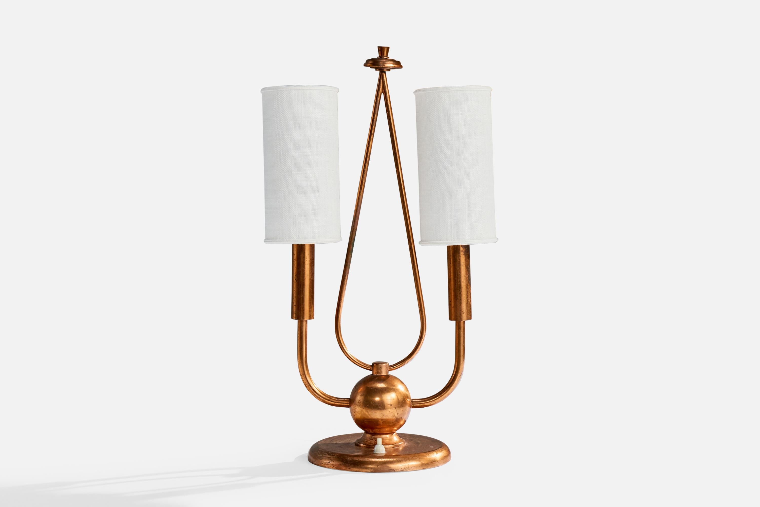 A copper and white fabric table lamp designed and produced in Italy, c. 1930s.

Oxidation present to copper. 

Replaced lampshades.

Wear consistent with age and use

Overall Dimensions (inches): 21.25
