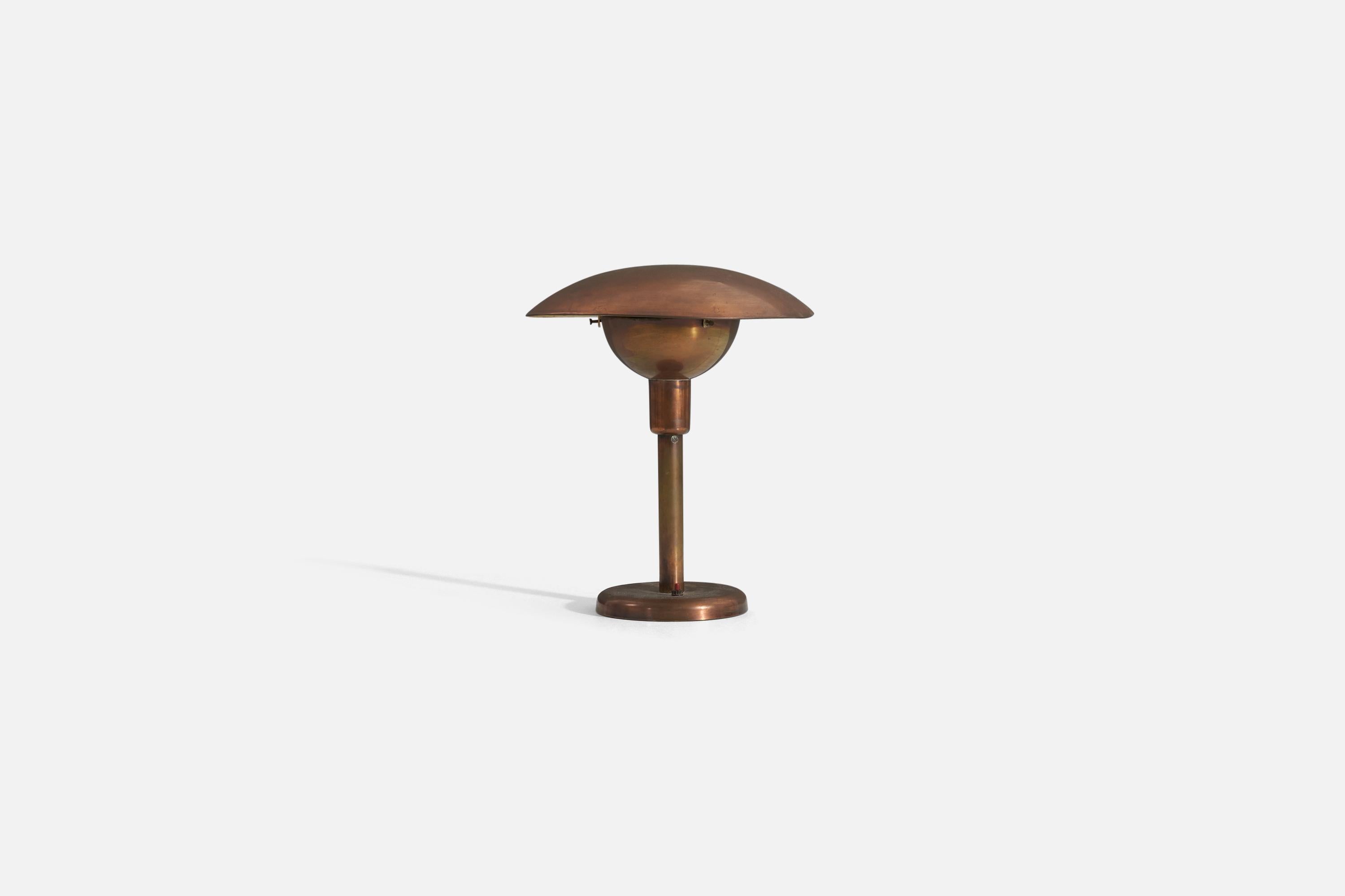 A copper table lamp designed and produced in Italy, 1940s.