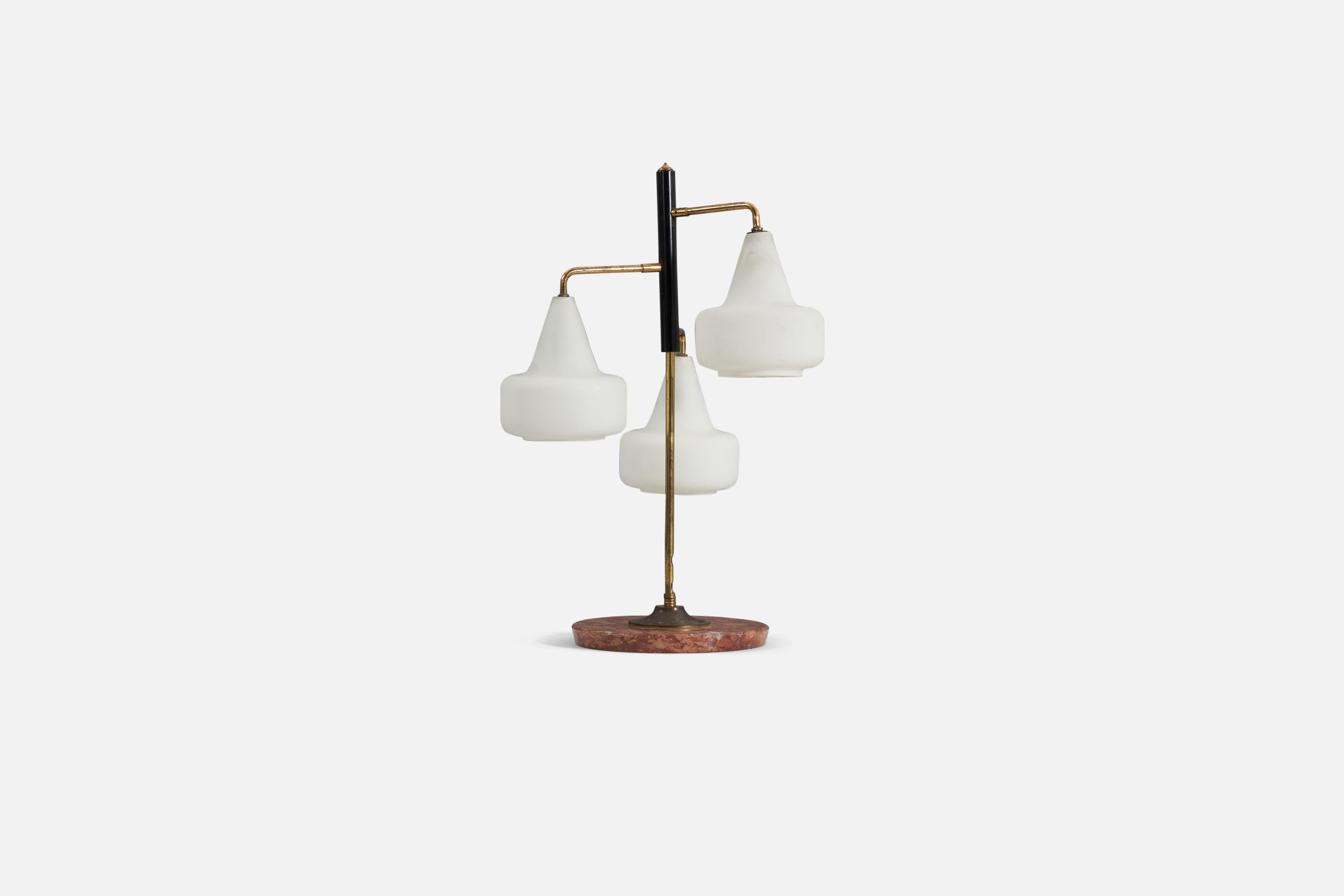 A three-armed table lamp designed and produced in Italy, 1950s featuring a marble base, brass stem with frosted glass shades.
