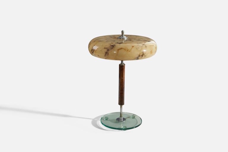 A glass, metal and wood table lamp designed and produced in Italy, 1940s.