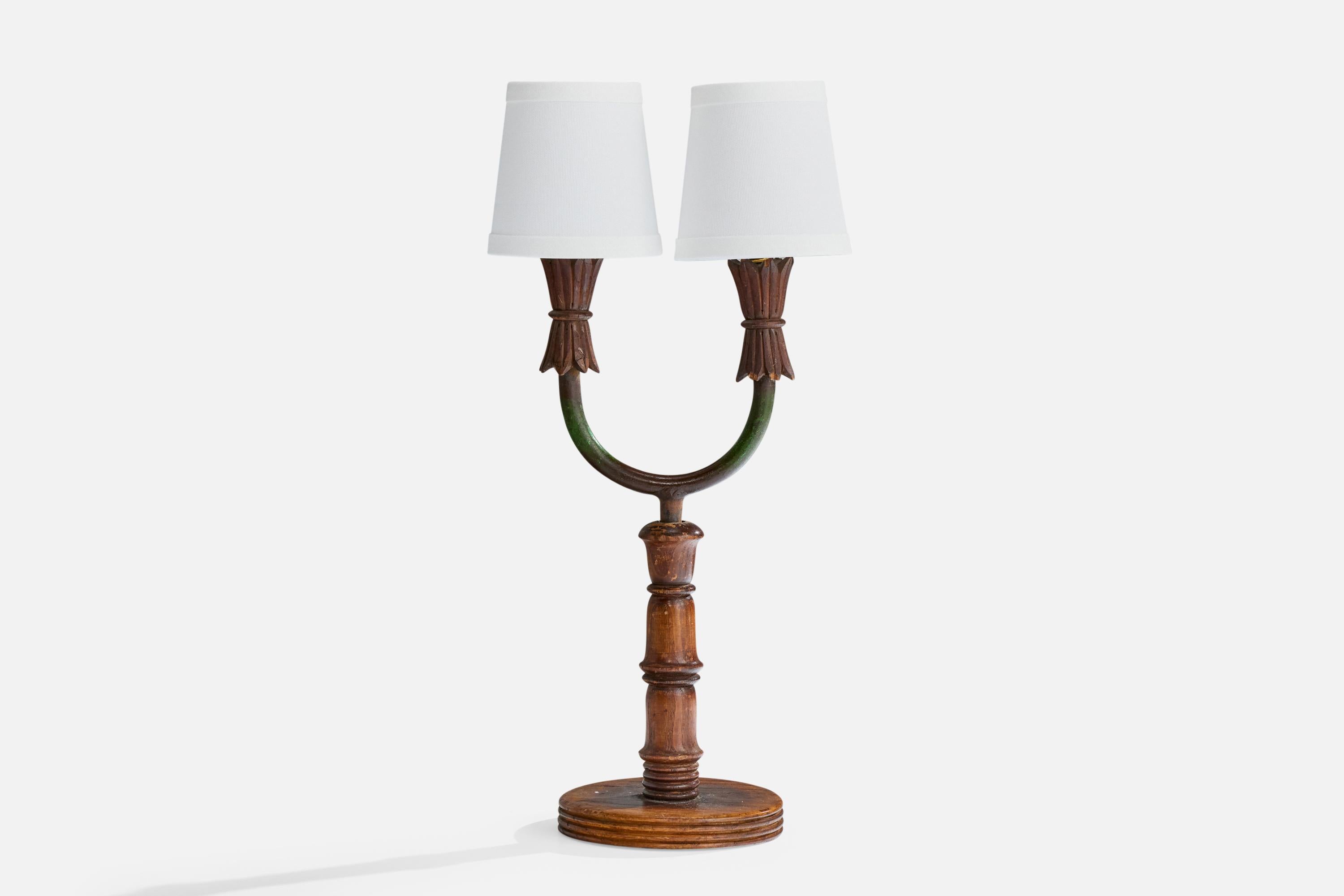 A wood, green-painted iron and white fabric table lamp designed and produced in Italy, c. 1940s.

Wear to wood consistent with age and use

Overall Dimensions (inches): 18