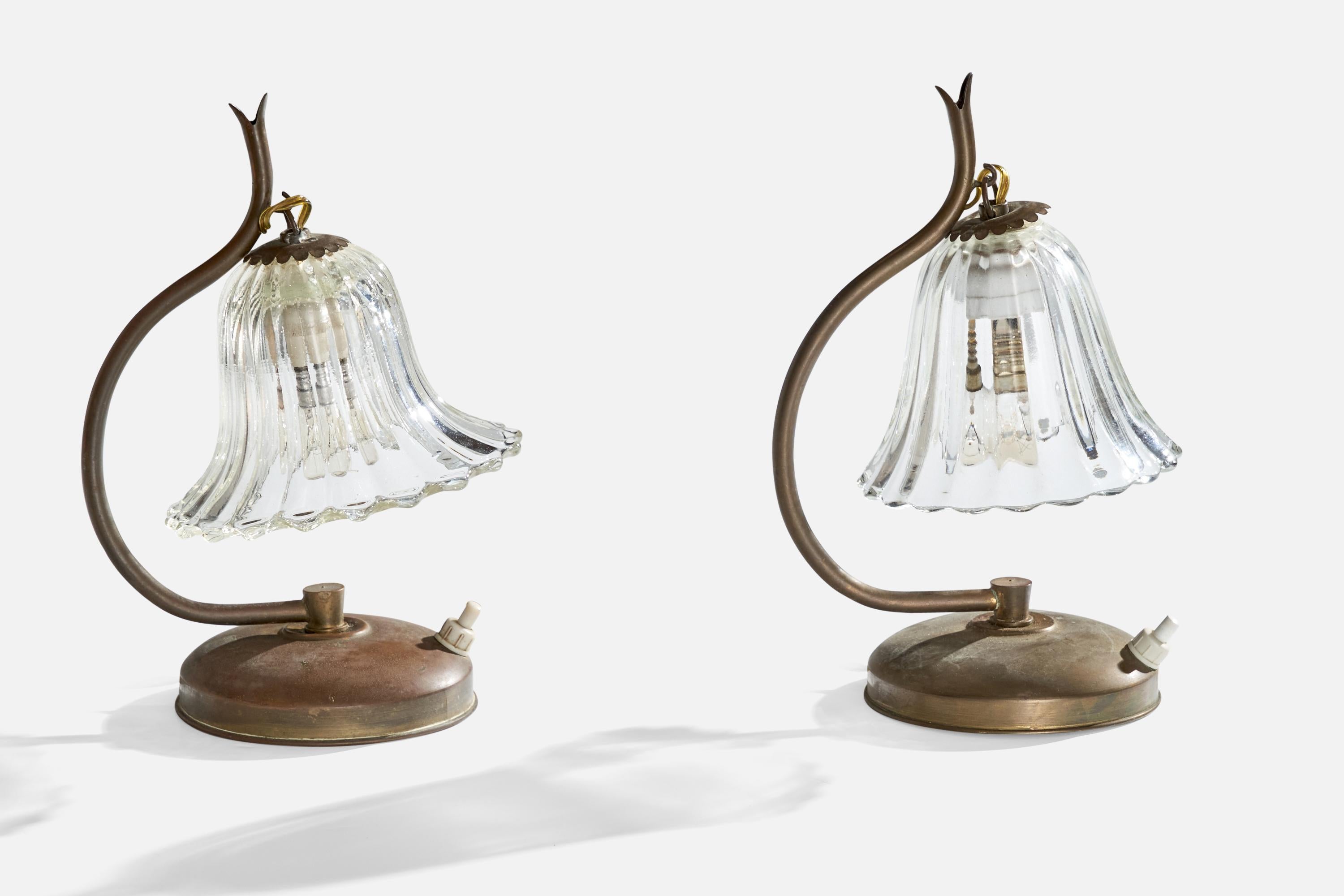 A pair of brass and Murano glass table lamps designed and produced in Italy, c. 1940s.

Dimensions of Lamp (inches): 8.75” H x 5.5” W x 5.5” D

Dimensions of Lamp with Shade (inches): 8.75” H x 5.5” Diameter

Bulb Specifications: E-14 Bulbs

Number
