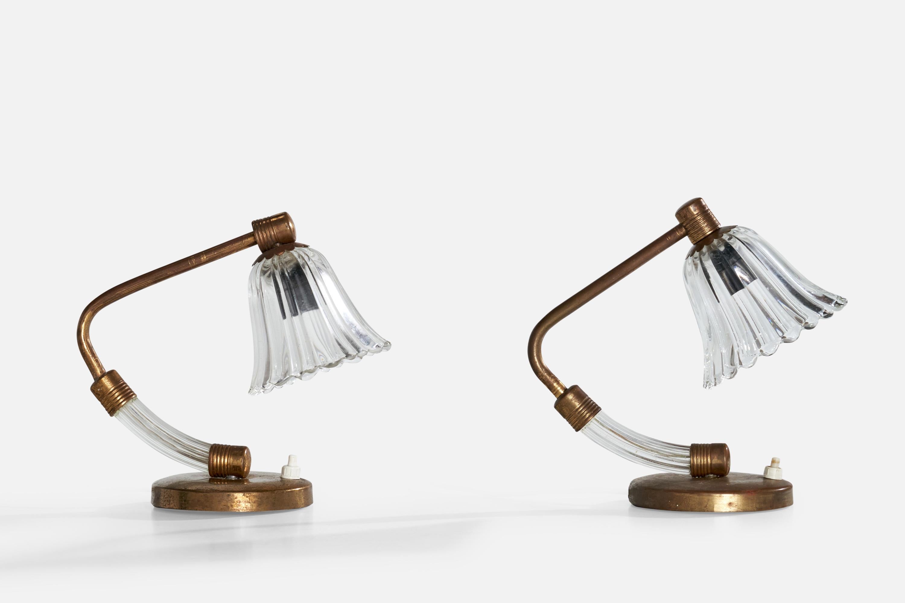 A pair of brass and Murano glass table lamps designed and produced in Italy, c. 1950s.

Dimensions of Lamp with Shade (inches): 8.375“ H x 4.5” W x 9” D

Bulb Specifications: E-14

Number of Sockets (per fixture): 1

Sold with lampshade.

All