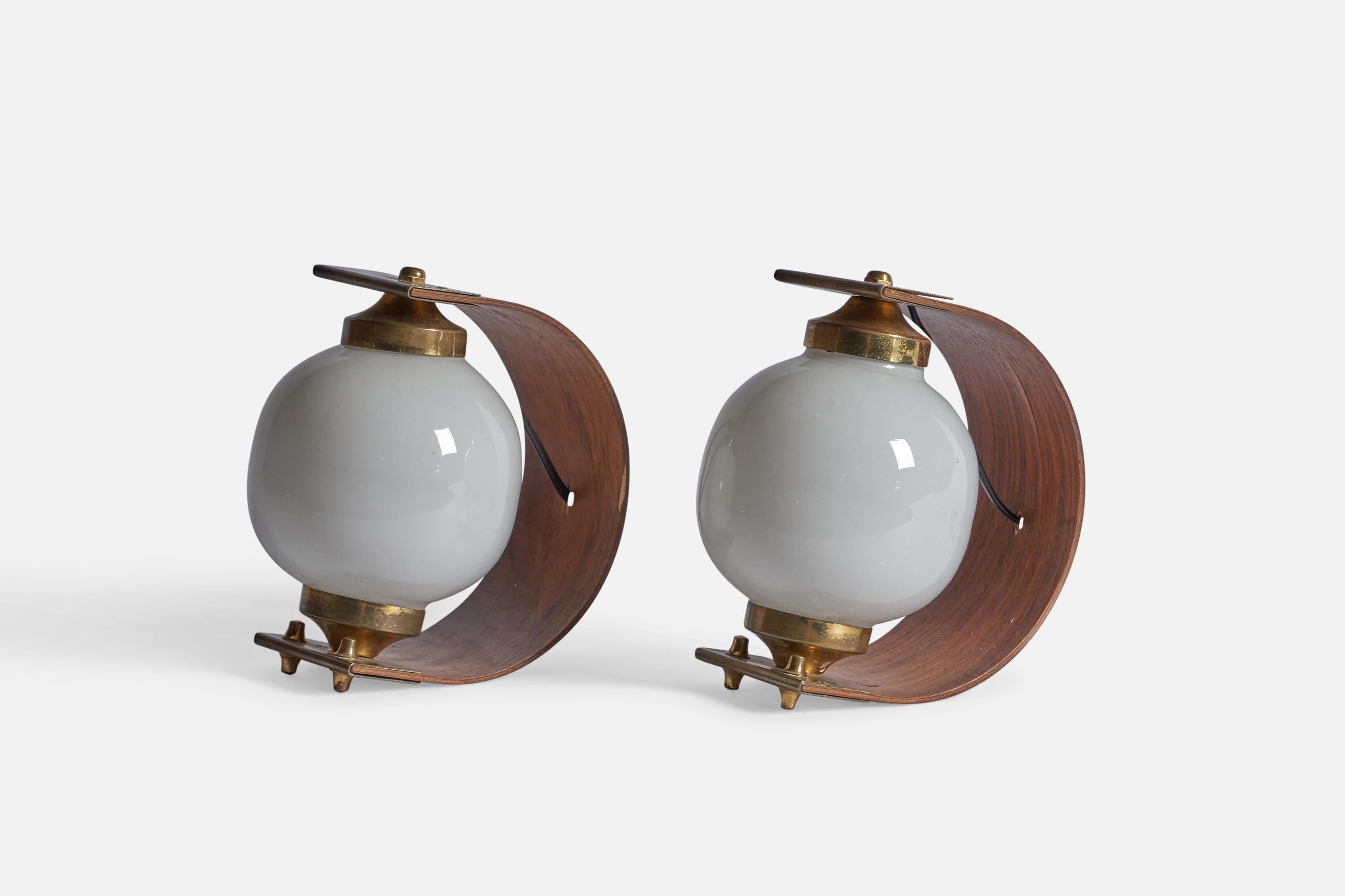A pair of brass, glass and moulded plywood table lamps, designed and produced in Italy, c. 1950s.