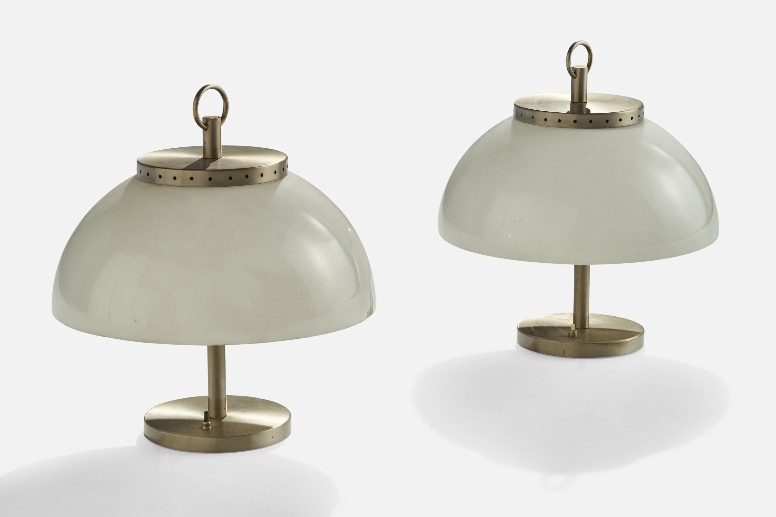 A pair of metal and acrylic table lamps designed and produced in Italy, c. 1960s.

Overall Dimensions (inches): 17” H x 15.75 W x 15.75D
Stated dimensions include shade.
Bulb Specifications: E-14 Bulb
Number of Sockets: 6
All lighting will be