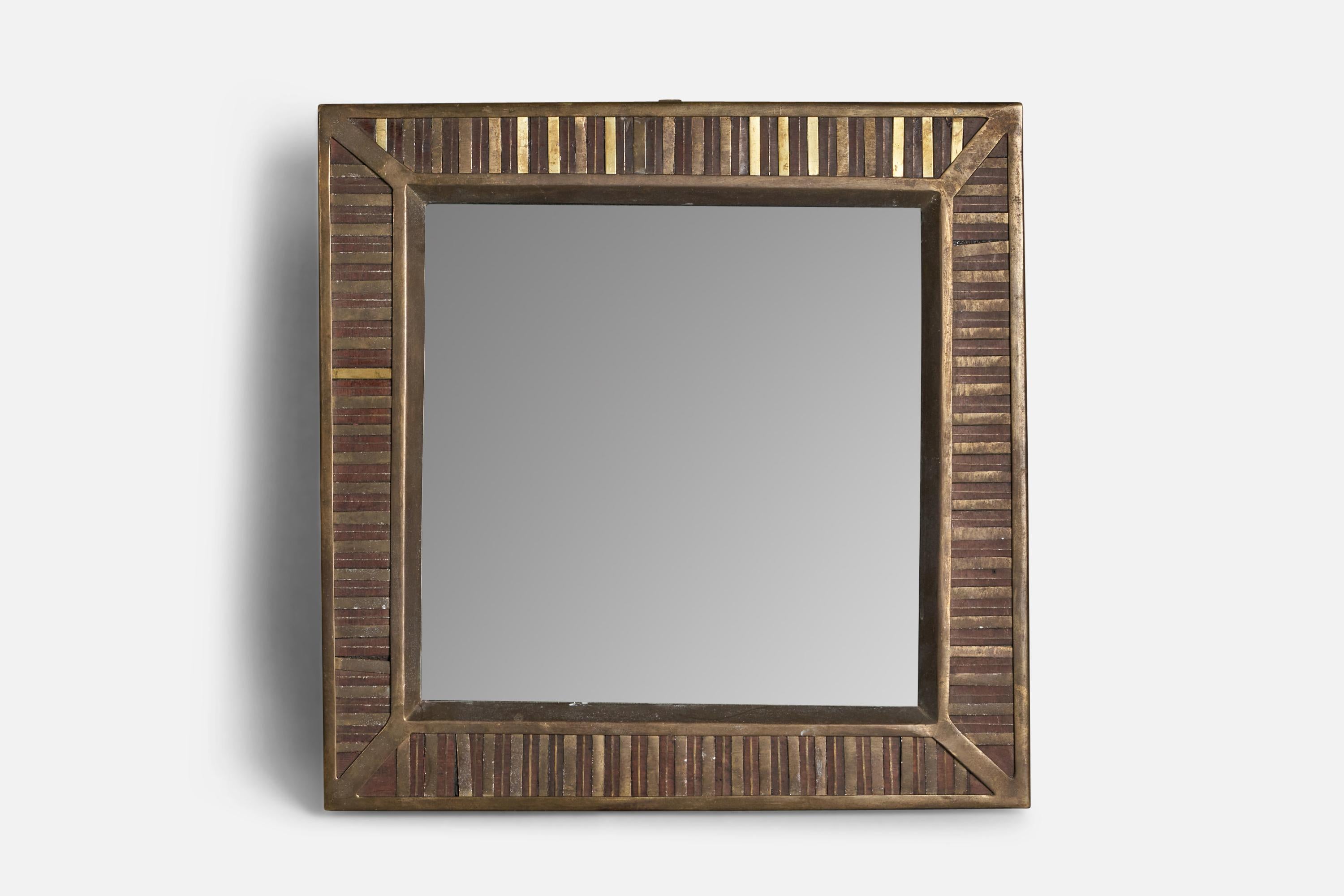 A brass table mirror with inlayed decoration, designed and produced in Italy, c. 1930s.

Stand adds 4.75