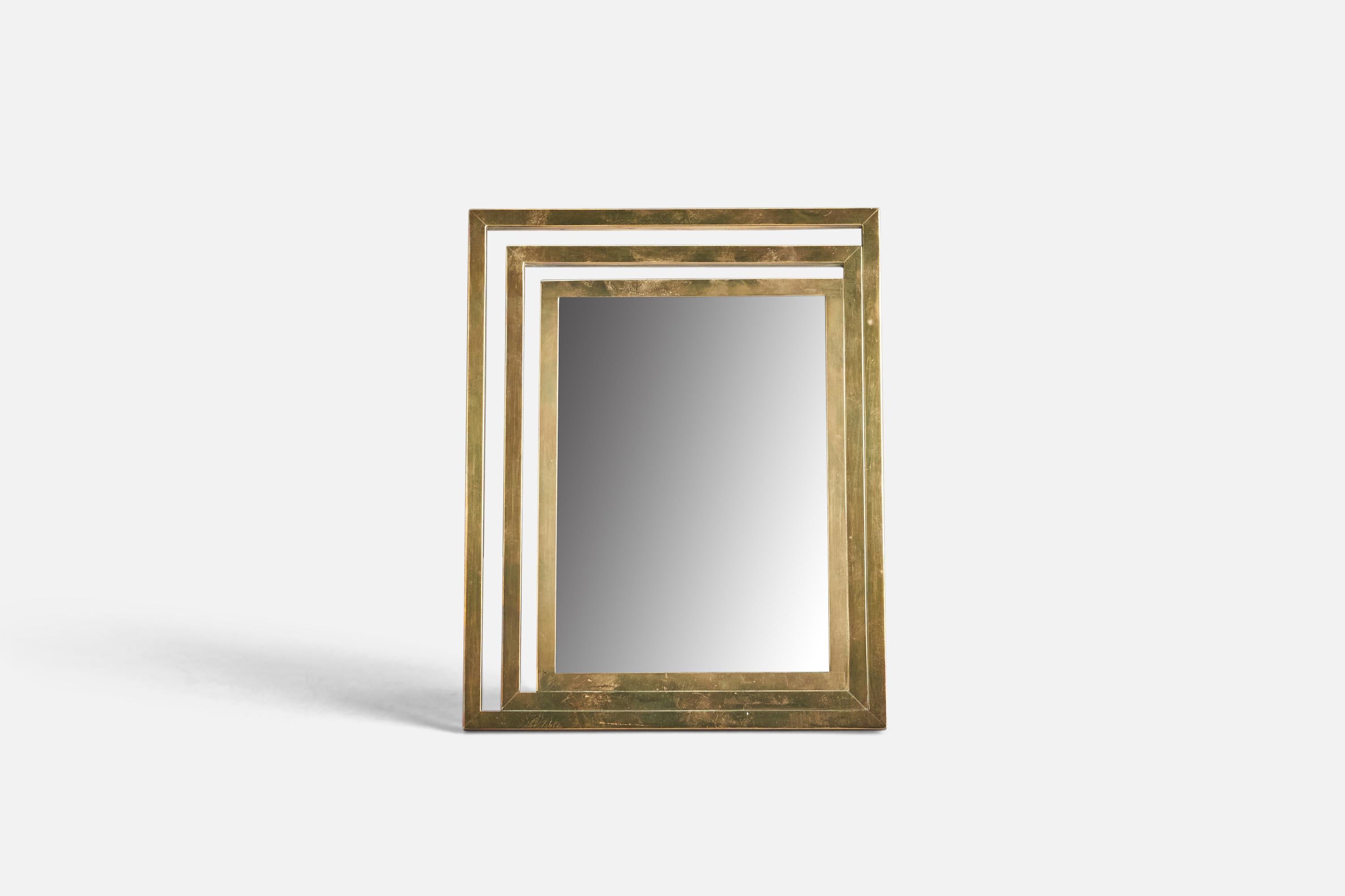 A brass table mirror designed and produced by an Italian Designer, Italy, 1970s.