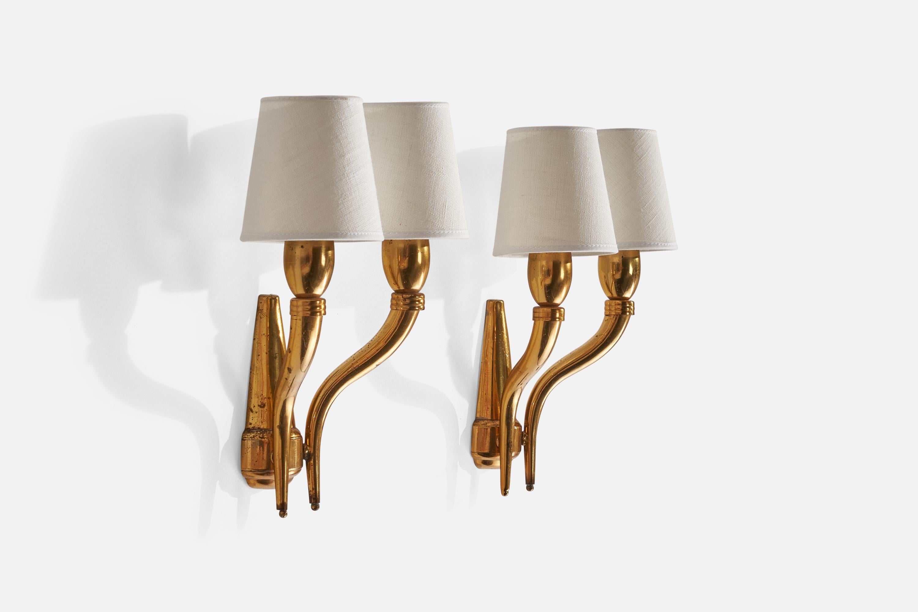 A pair of two-armed brass and white fabric wall lights designed and produced in Italy, 1930s.

Overall Dimensions (inches): 11.82” H x 9.45”  W x 5.32”D
Back Plate Dimensions (inches): 6” H x 2.50” W x 1” D
Bulb Specifications: E-14 Bulb
Number of