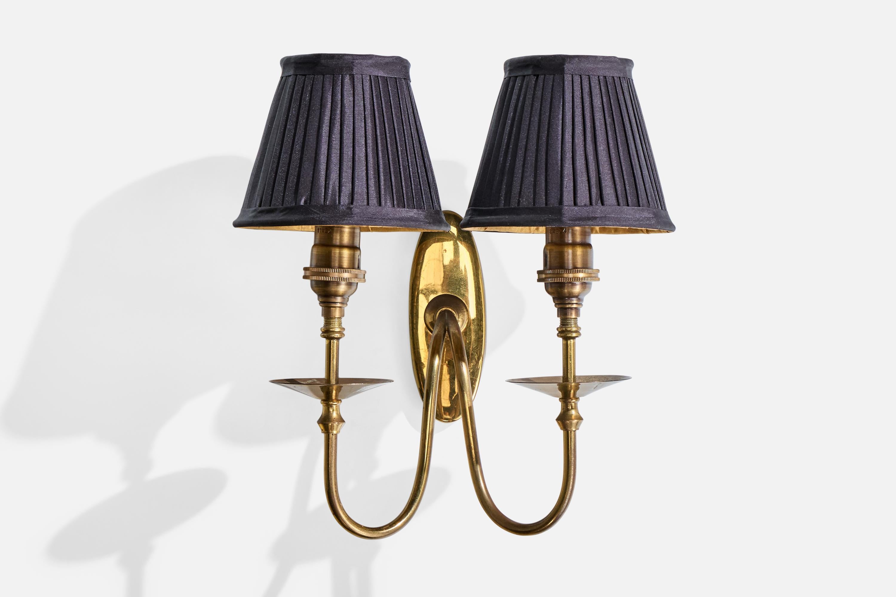 A brass and black fabric wall light designed and produced in Italy, c. 1950s.

Oxidation present to brass. 

Sockets replaced.

Overall Dimensions (inches): 10.0