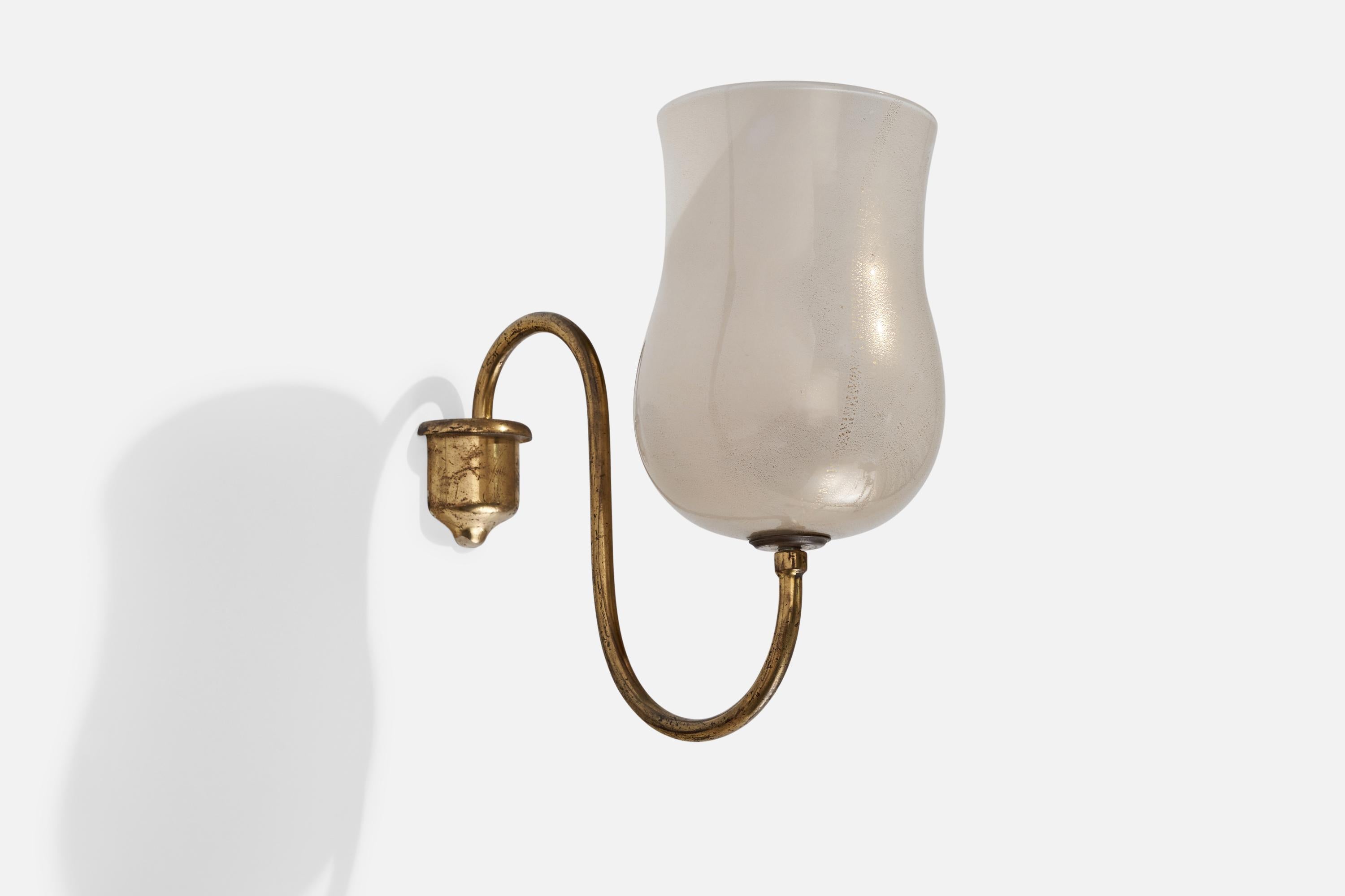 A brass and glass wall light designed and produced in Italy, 1930s.

Overall Dimensions (inches): 10” H x 4.125” W x 10” D
Back Plate Dimensions (inches): 2.25” H x 2.22” W x 1.16” D
Bulb Specifications: E-26 Bulb
Number of Sockets: 1
All lighting