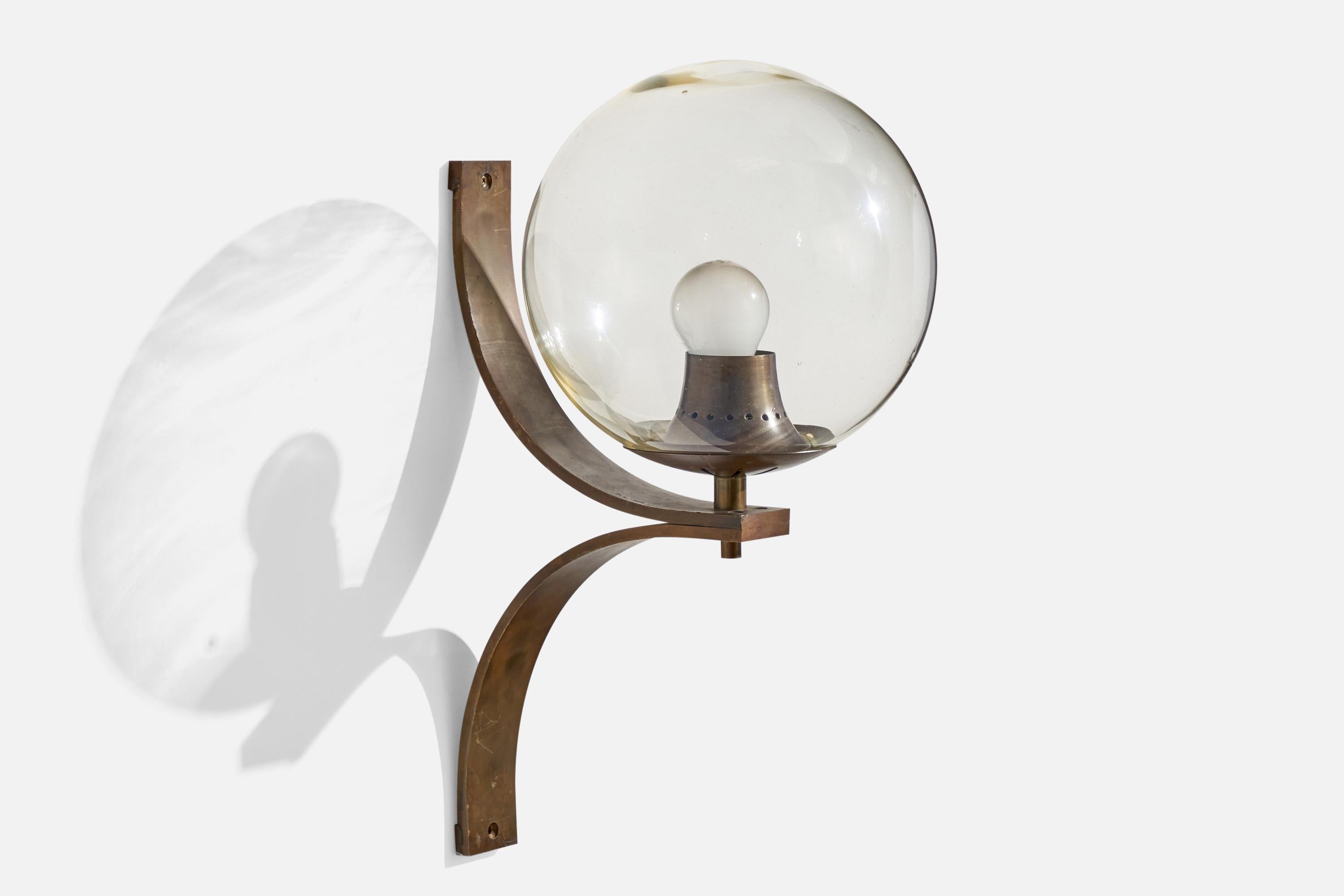 A brass and glass wall light designed and produced in Italy, c. 1950s.

Overall Dimensions (inches):  23.25” H x 9” D
Back Plate Dimensions (Inches):  23.25” H x 9” D
Bulb Specifications:E-26 Bulb
Number of Sockets (per fixture): 1

Does not include