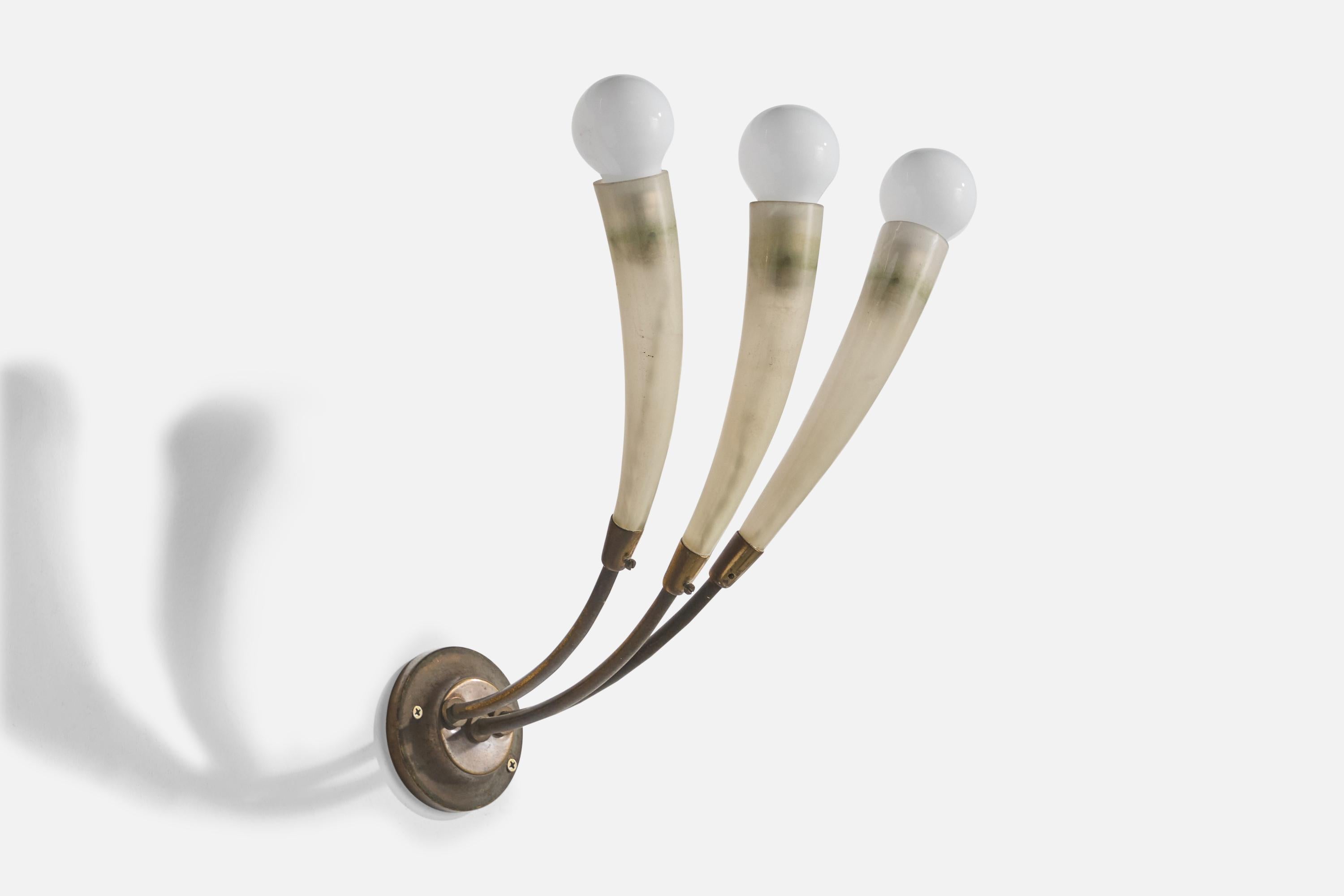 A brass and glass wall light designed and produced in Italy, c. 1950s.

Light staining on glass.

Overall Dimensions (Inches): 12.5” H x 7.5” W x 10.5“ D

Back Plate Dimensions (Inches): 3” H x 3“ W x .875” D

Bulb Specifications: E-14 frosted