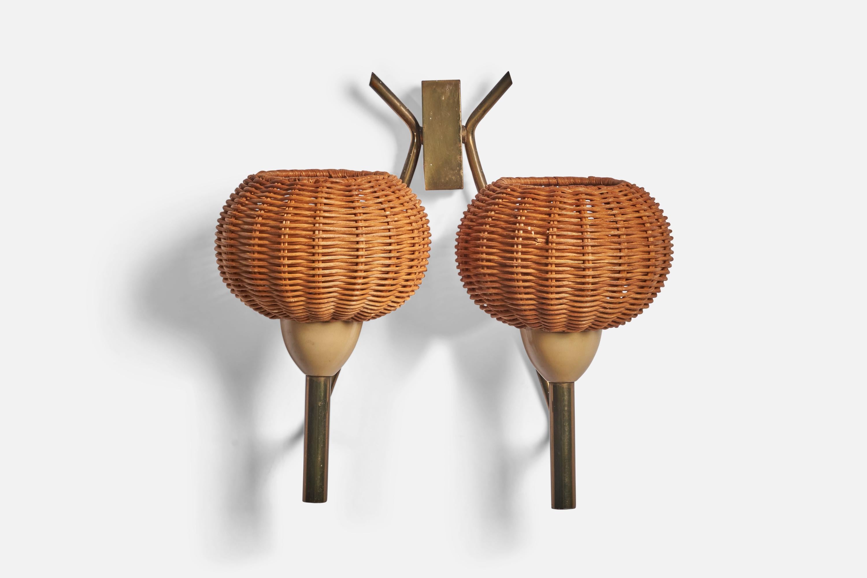 A pair of beige-lacquered metal, brass and rattan wall lights, designed and produced in Italy, c. 1940s.

Overall Dimensions: 11.25