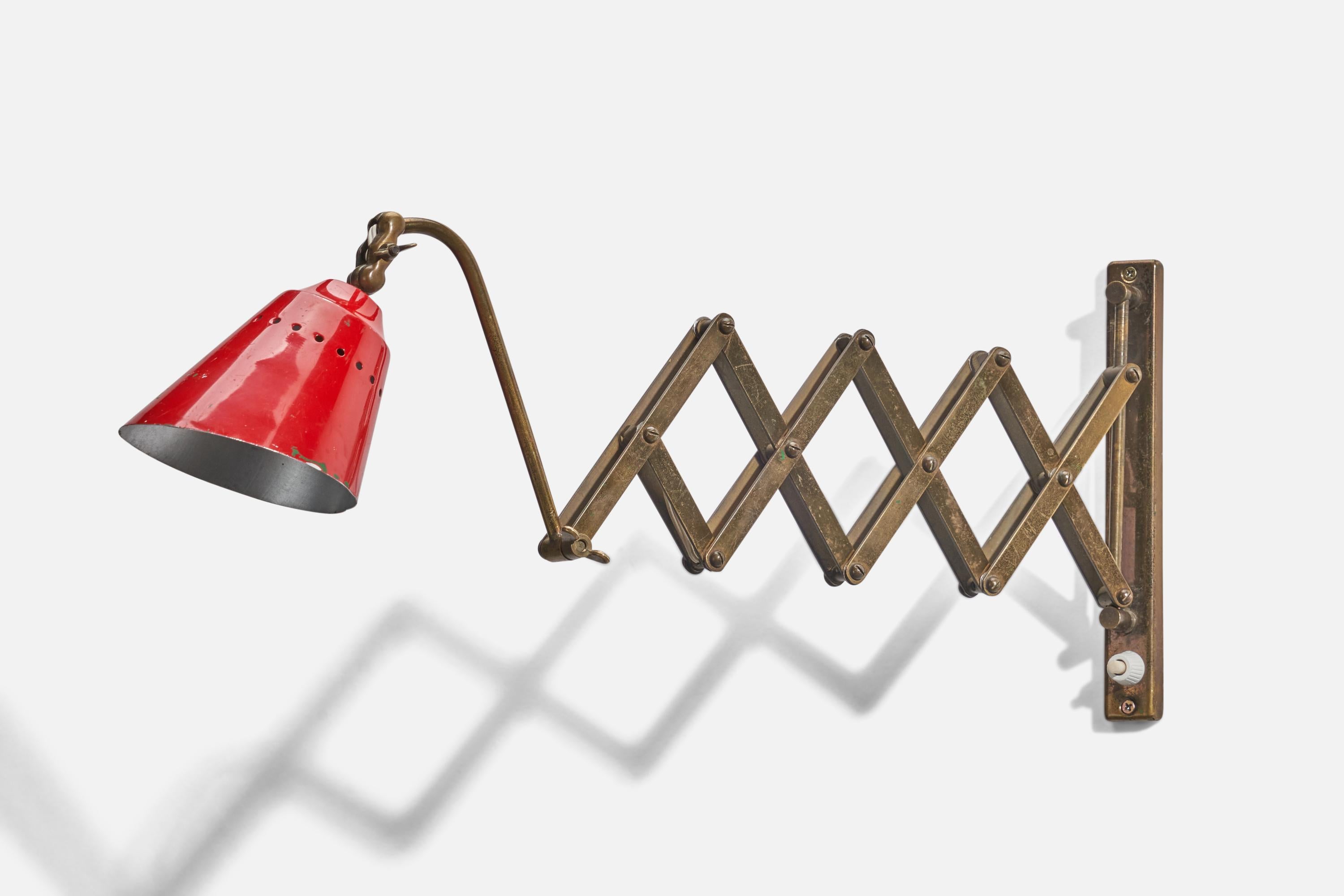 A brass and red-lacquered metal adjustable wall light designed and produced by an Italian Designer, Italy, 1940s. 

Dimensions of Back Plate (inches) : 8 x 0.98 x 0.4 (Height x Width x Depth)

Socket takes E-14 bulb.

There is no maximum