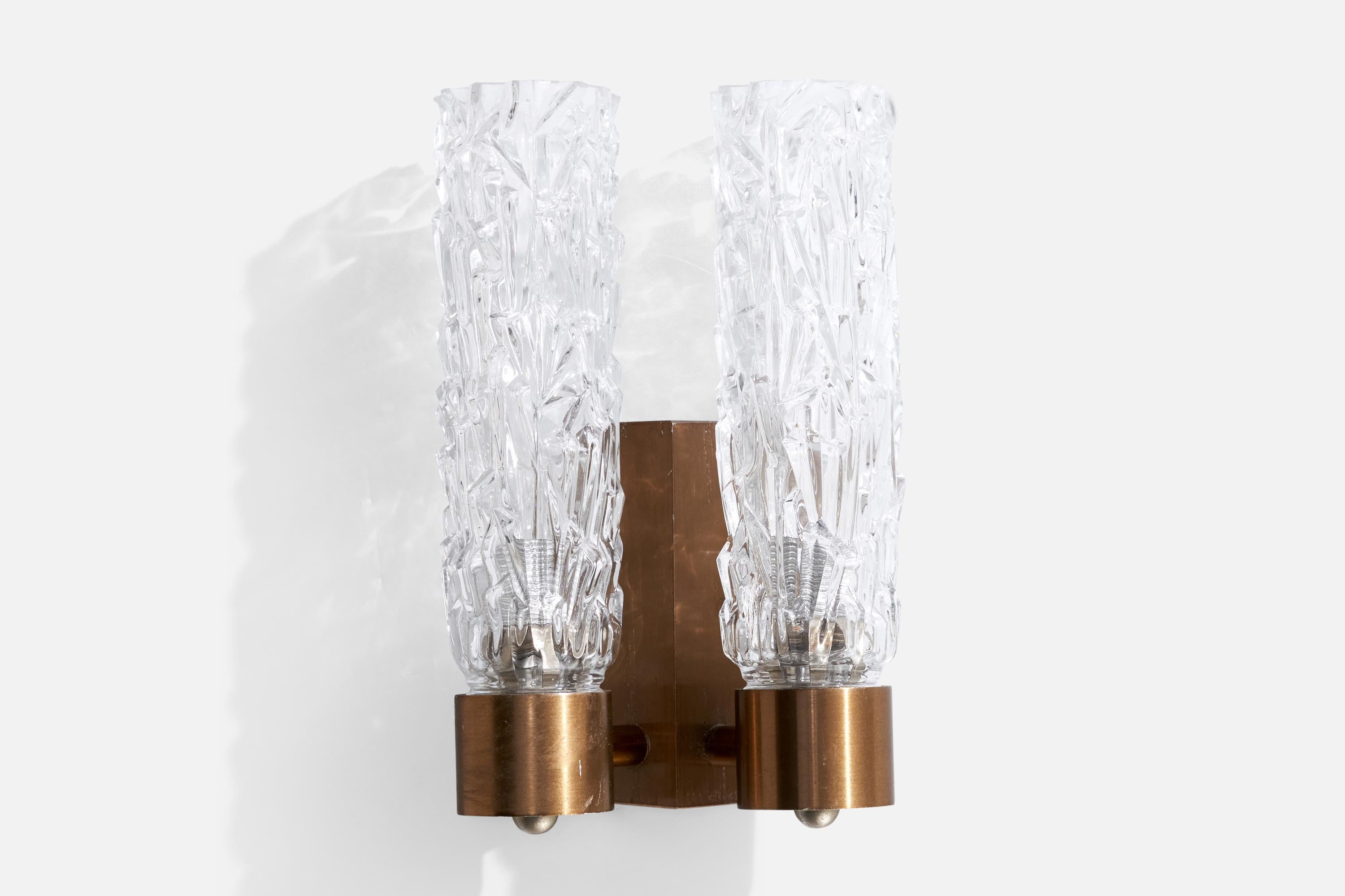 A two-armed copper and glass wall light, designed and produced in Italy, 1950s. 

Overall Dimensions (inches): 9.25