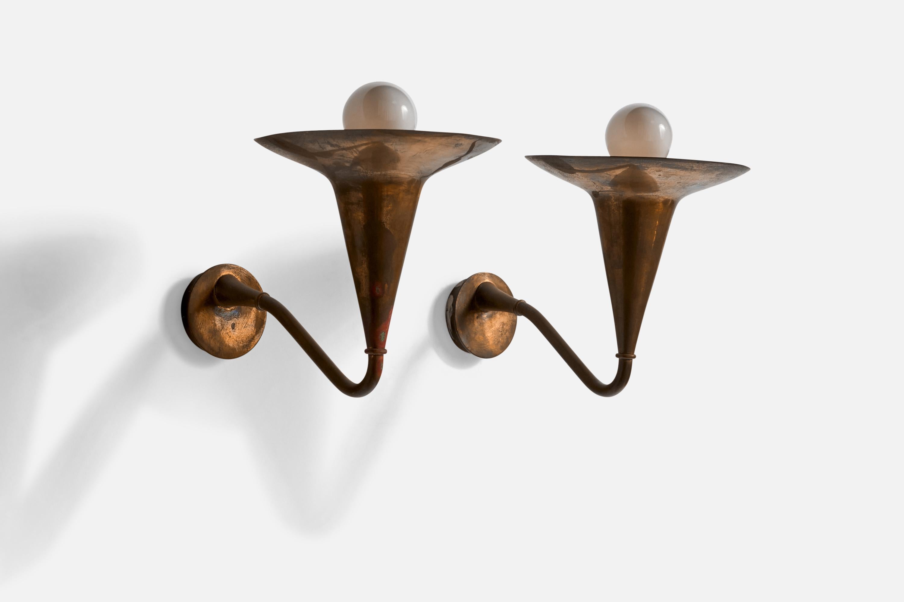 A pair of copper wall lights designed and produced in Italy, 1940s.

Overall Dimensions (inches): 6.5” H x 6” W x 10” D
Back Plate Dimensions (inches): 2.25” H x 2.25” W x .50” D
Bulb Specifications: E-26 Bulb
Number of Sockets: 2
All lighting will