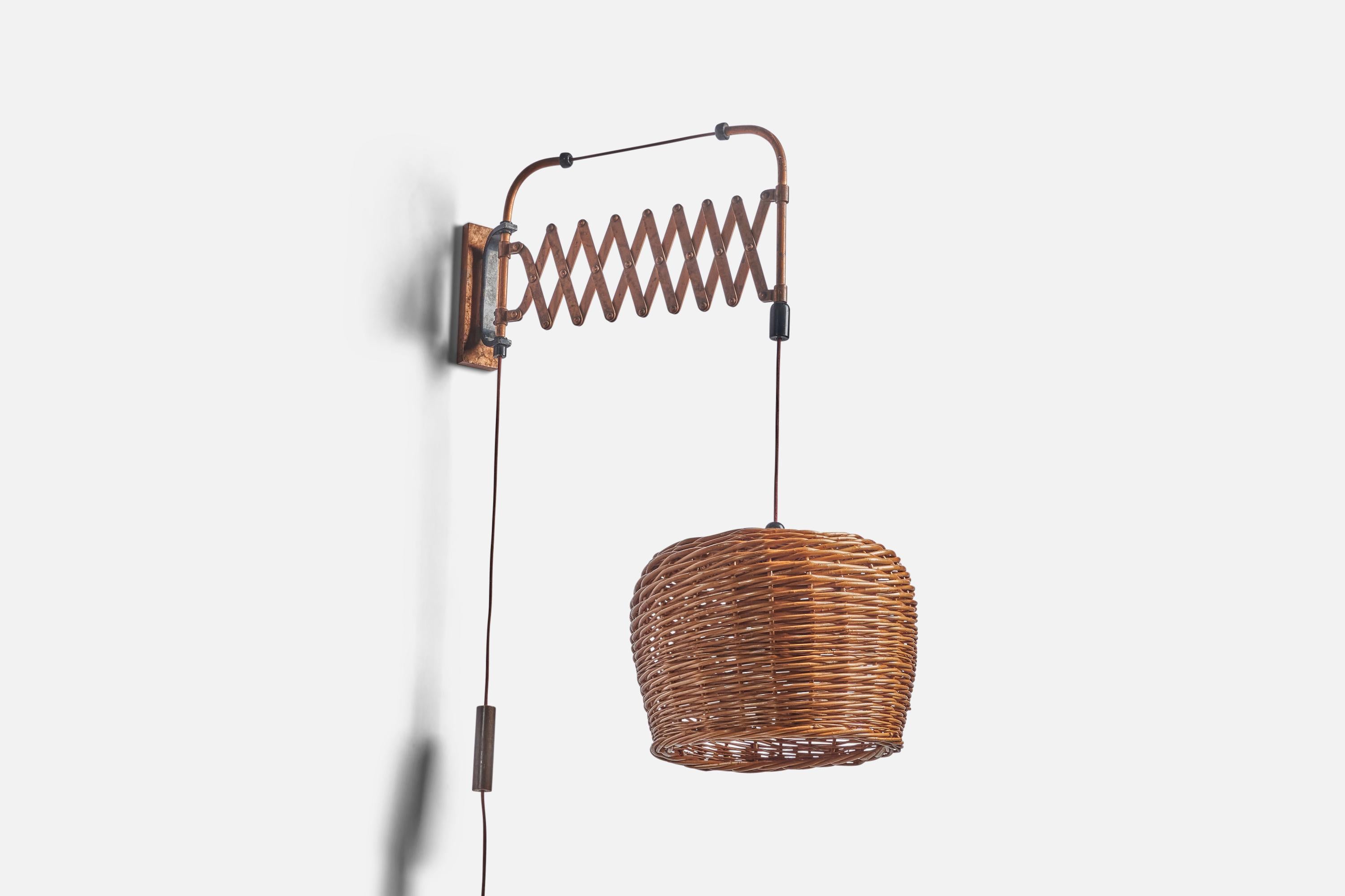 
An adjustable copper and rattan wall light designed and produced in Italy, c. 1940s.
Overall Dimensions (inches): 11.05” H x 11.45” W x 6.35” D
Back Plate Dimensions (inches): 7.5” H, 2”:W, 0.5” D
Bulb Specifications: E-26 Bulb
Number of Sockets: