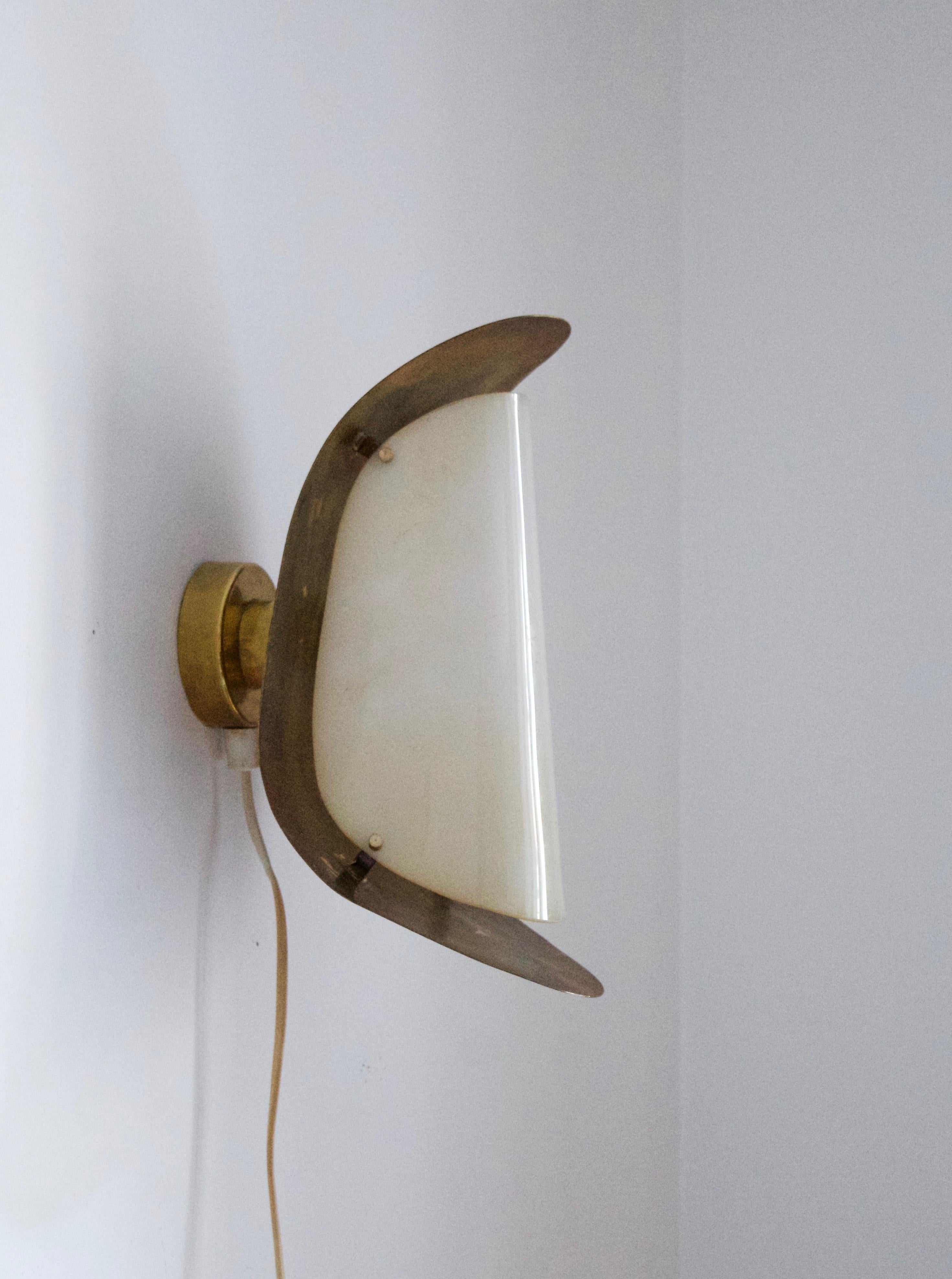 A wall light / Sconce. Designed and produced in Italy, 1950s-1960s.

Other designers of the period include Paavo Tynell, Jean Royère, Hans Bergström, Hans-Agne Jakobsson, and Kaare Klint.