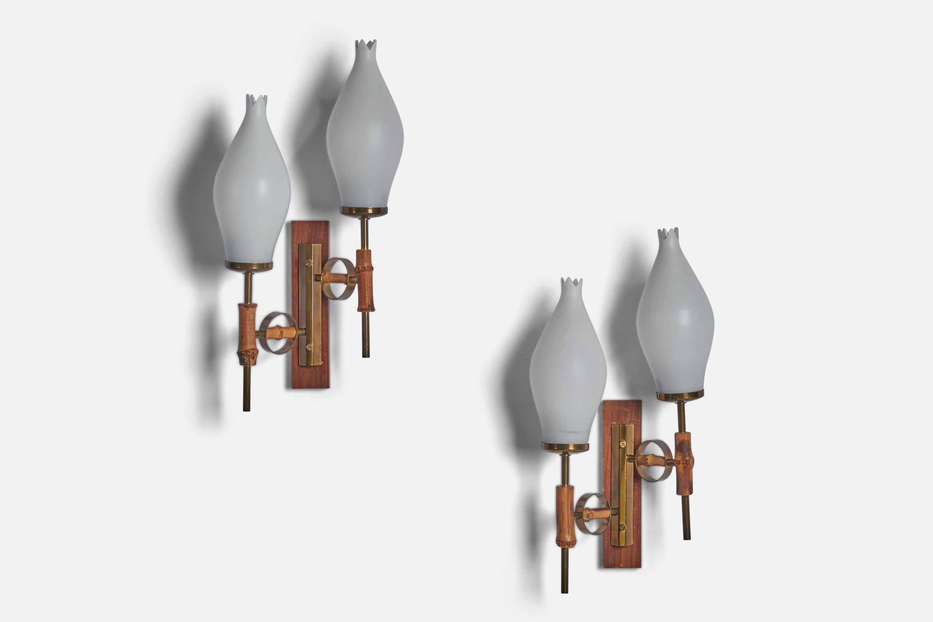 A pair of two-armed brass, bamboo, opaline glass and teak wall lights designed and produced in Italy, 1950s.

Overall Dimensions (inches): 14.75” H x 7.75” W x 4” D
Back Plate Dimensions (inches): 6.75” H x 1.5” W x 0.5” D
Bulb Specifications: E-14