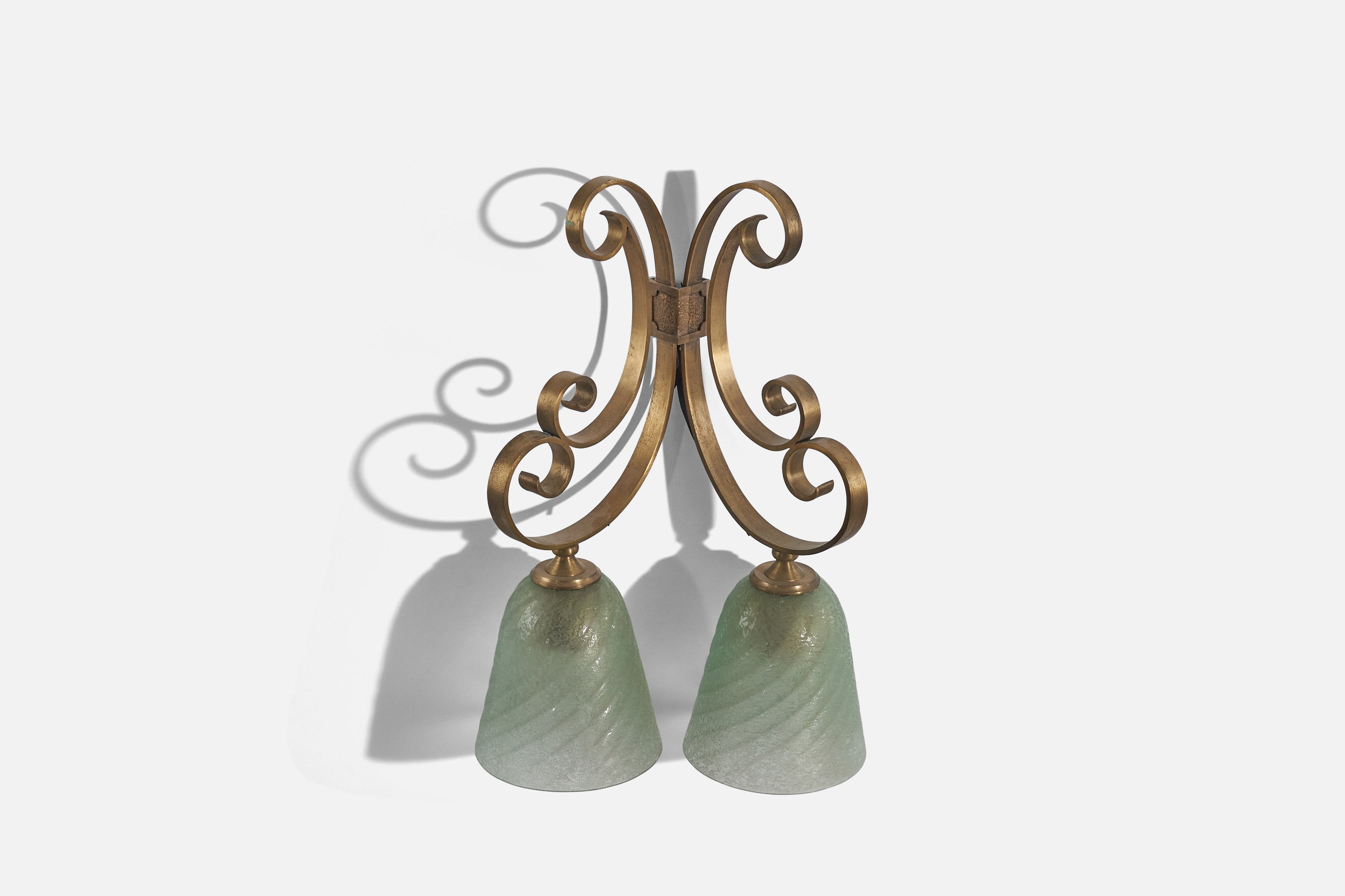 A pair of brass and glass wall lights designed and produced by an Italian designer, Italy, 1930s.

