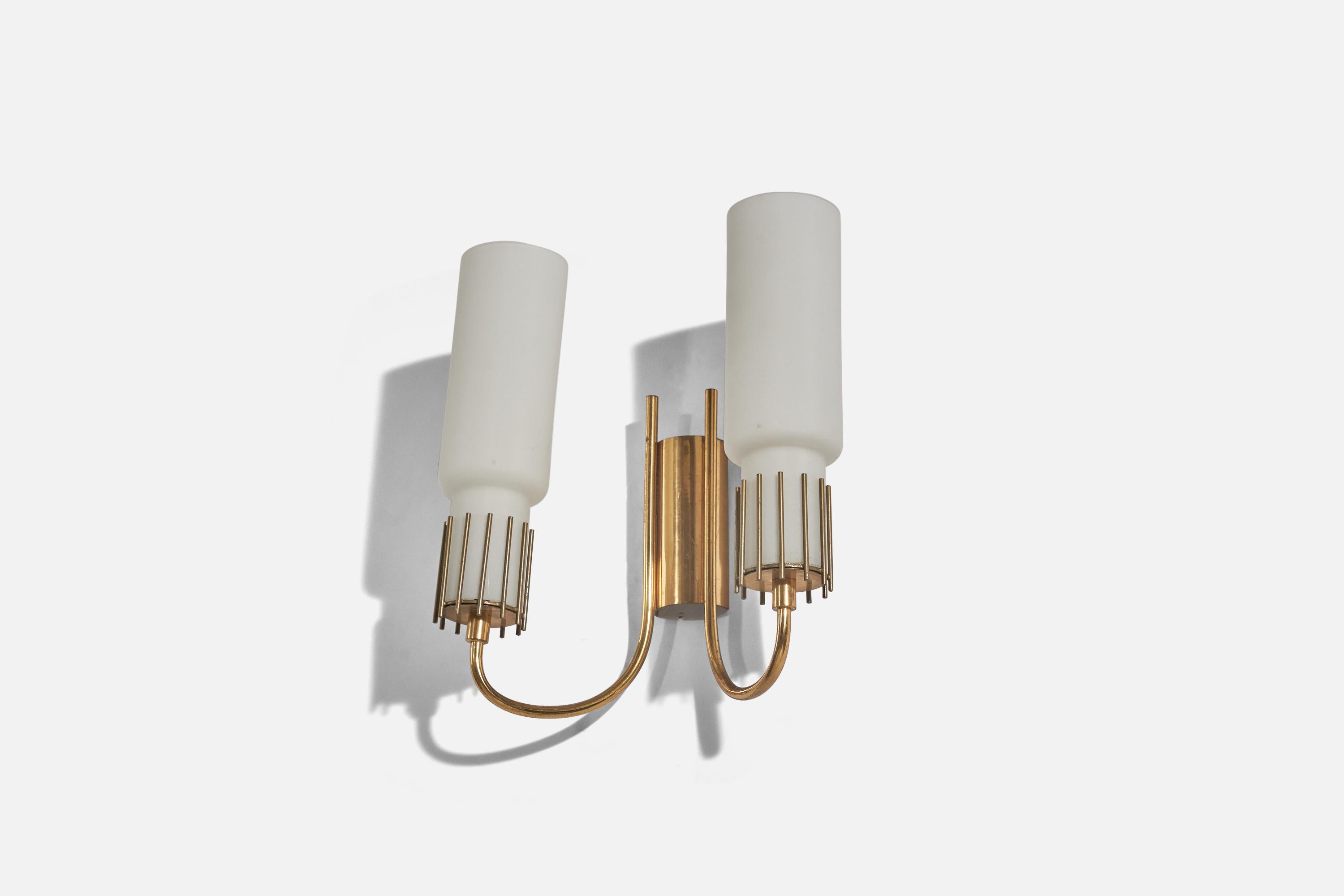 A pair of two-armed brass and glass wall lights designed and produced by an Italian designer, Italy, 1950s.

