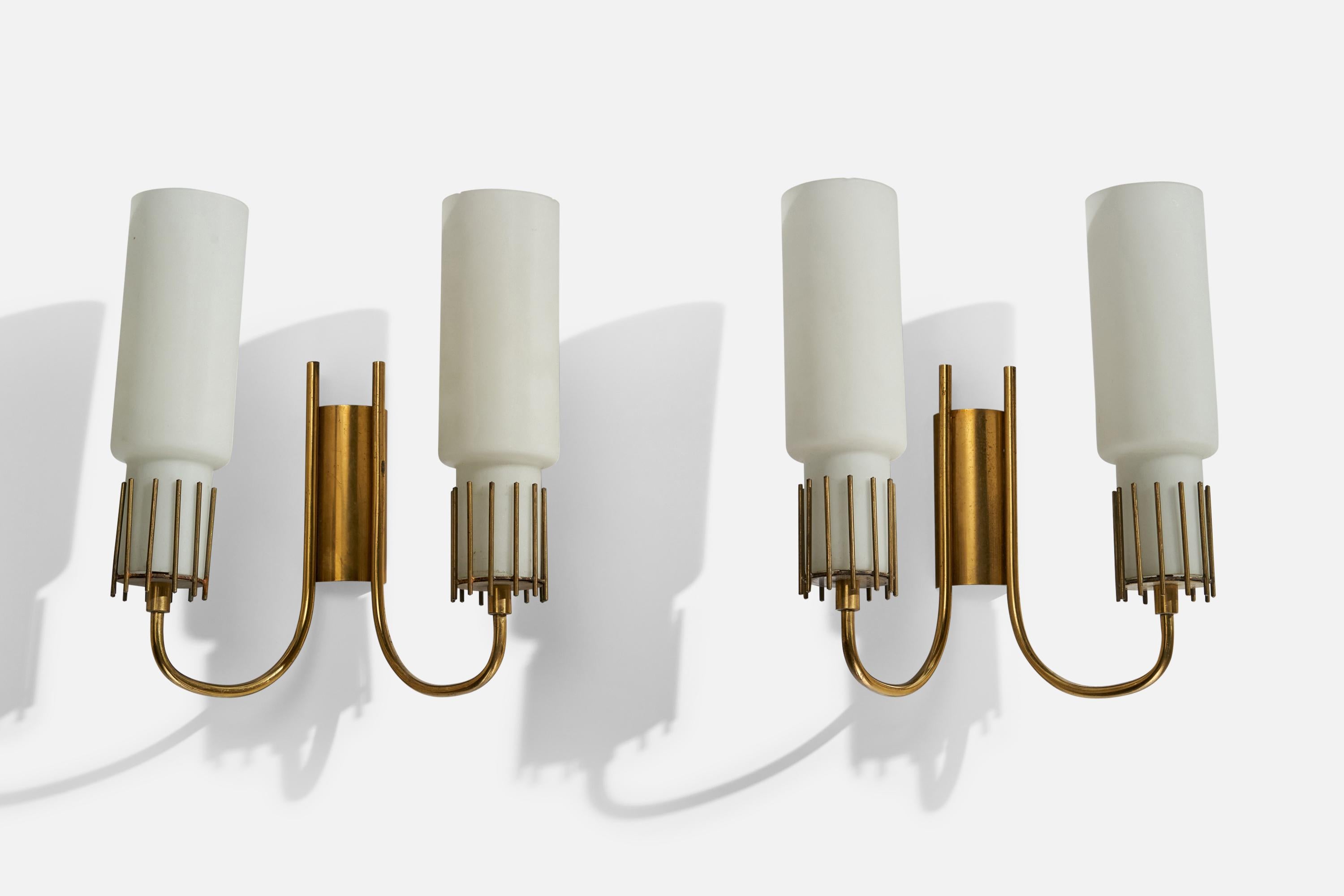 A pair of brass and opaline glass wall lights designed and produced in Italy, 1950s.

Overall Dimensions (inches): 11.6”  H x 10.25” W x 5.25” D
Back Plate Dimensions (inches): 4.25”  H x 1.95” W x 1”D
Bulb Specifications: E-14 Bulb
Number of