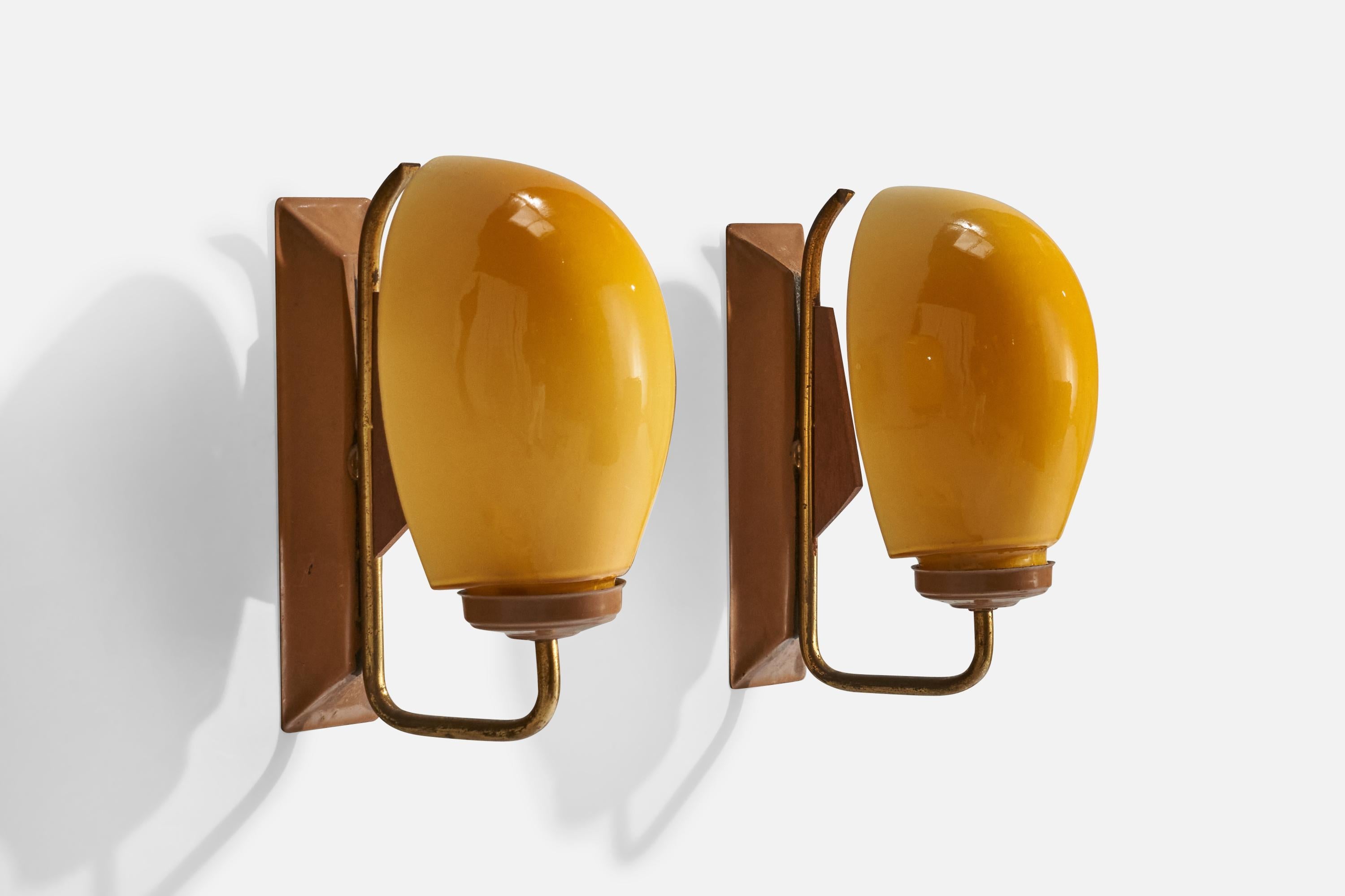 A pair of brass, brown-lacquered metal, teak and yellow opaline glass wall lights designed and produced in Italy, c. 1950s.

Overall Dimensions (inches):  8.125