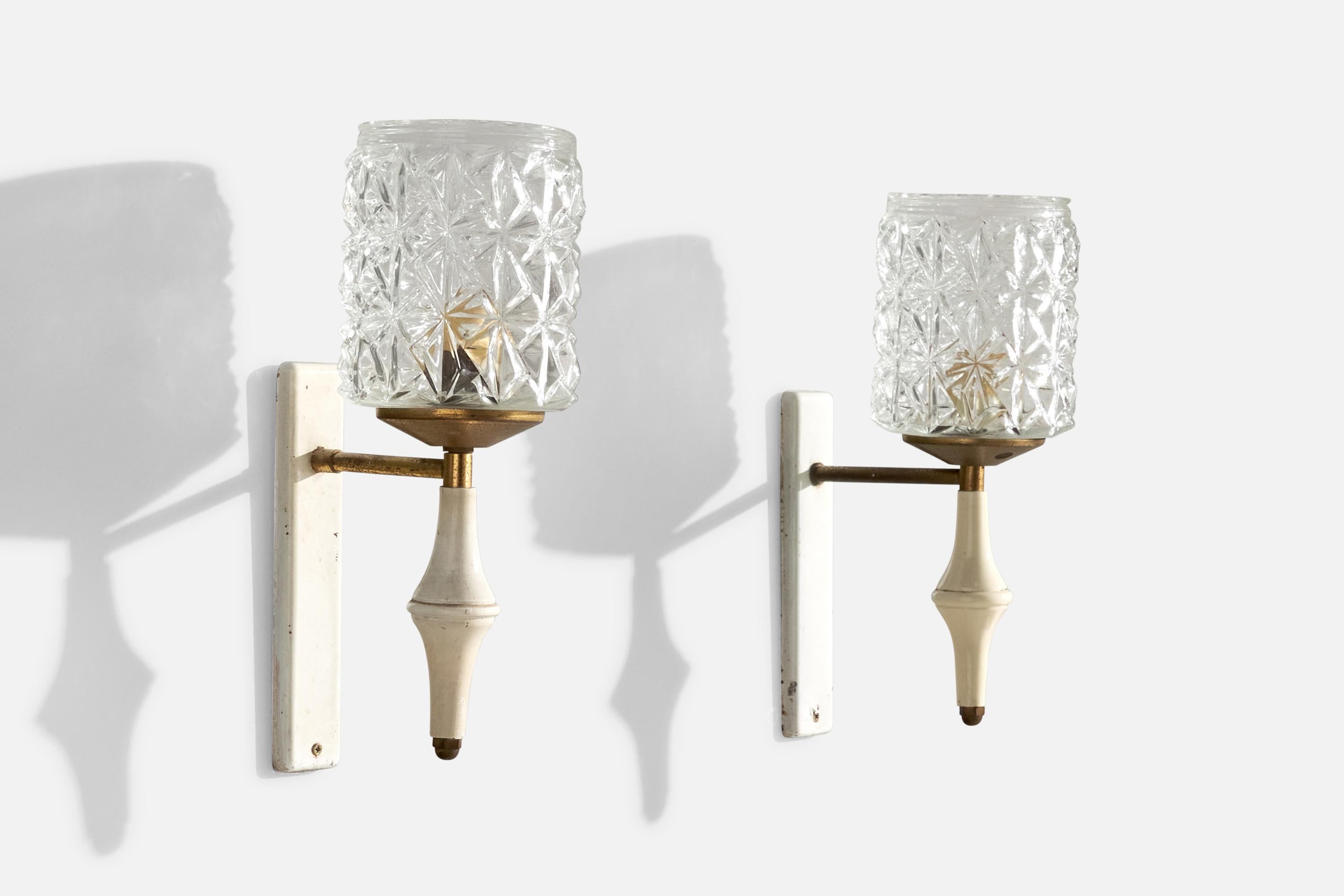 A pair of glass, brass, white lacquered metal and wood wall lights designed and produced in Italy, c. 1950s.

Overall Dimensions (inches):  12.5” H x  4.125” W x  7“D
Back Plate Dimensions (Inches):  8” H x 1.5” W x .5” D
Bulb Specifications: E-14