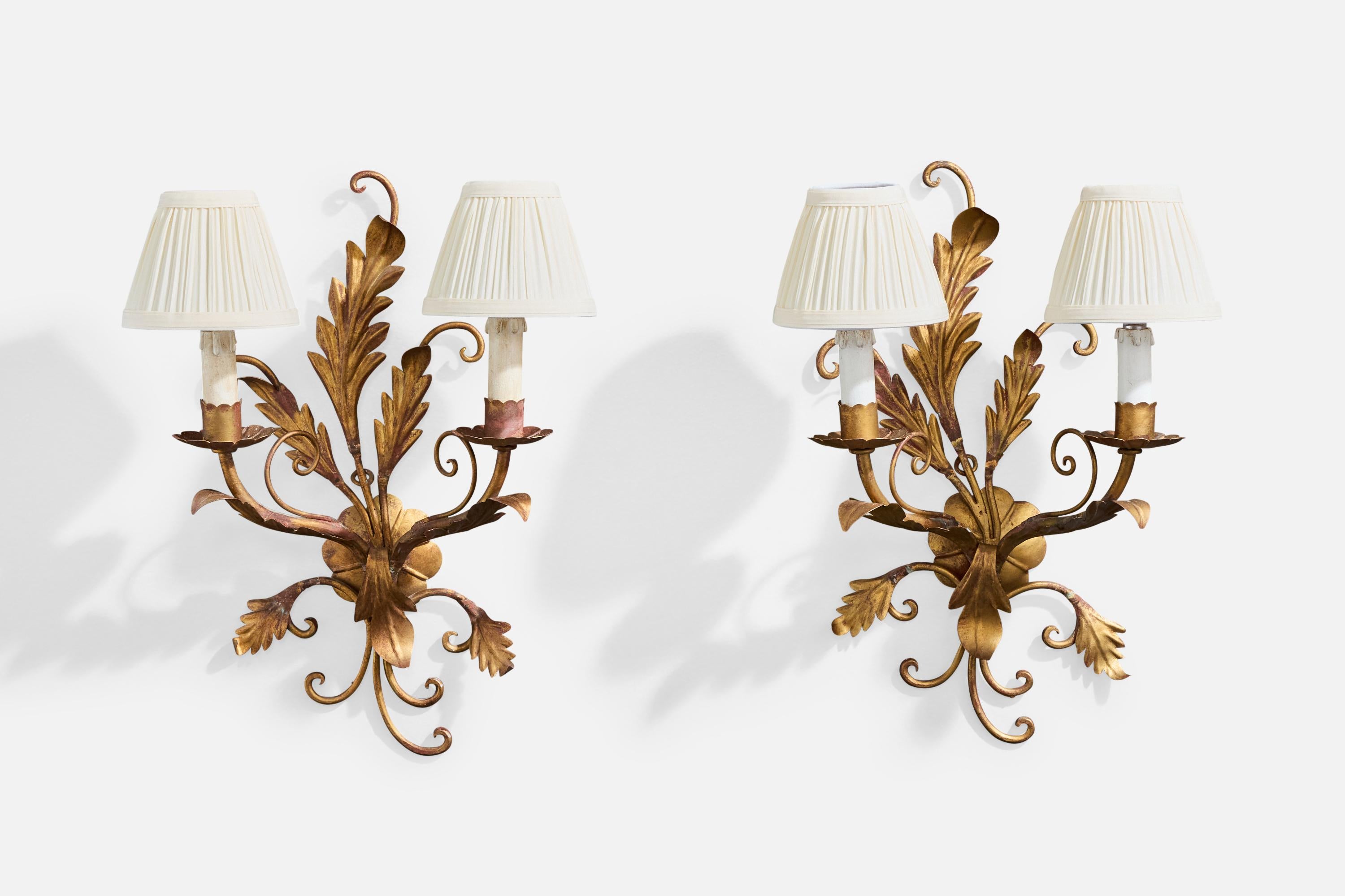A pair of bronze-painted metal, plastic and off-white fabric wall lights designed and produced in Italy, c. 1940s.

Metal presents with very heavy oxidation throughout. Brand new lampshades.

Overall Dimensions (Inches): 18.0