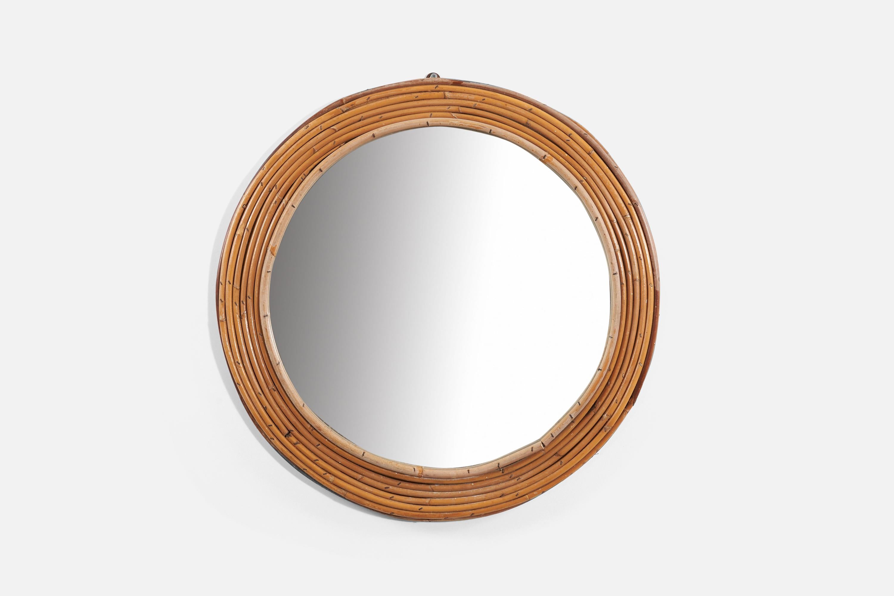 A bamboo wall mirror produced in Italy, 1950s. 
 