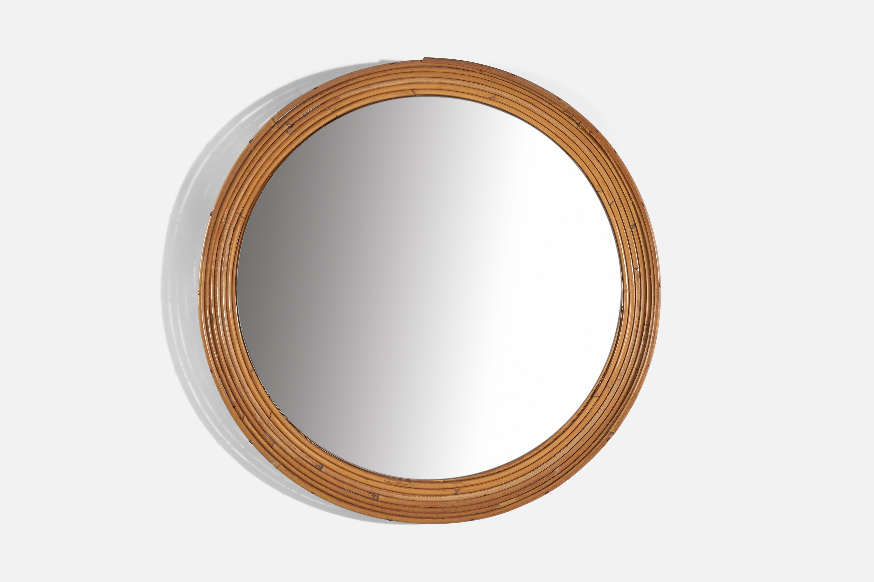 A circular, bamboo wall mirror designed and produced in Italy, c. 1950s.
 