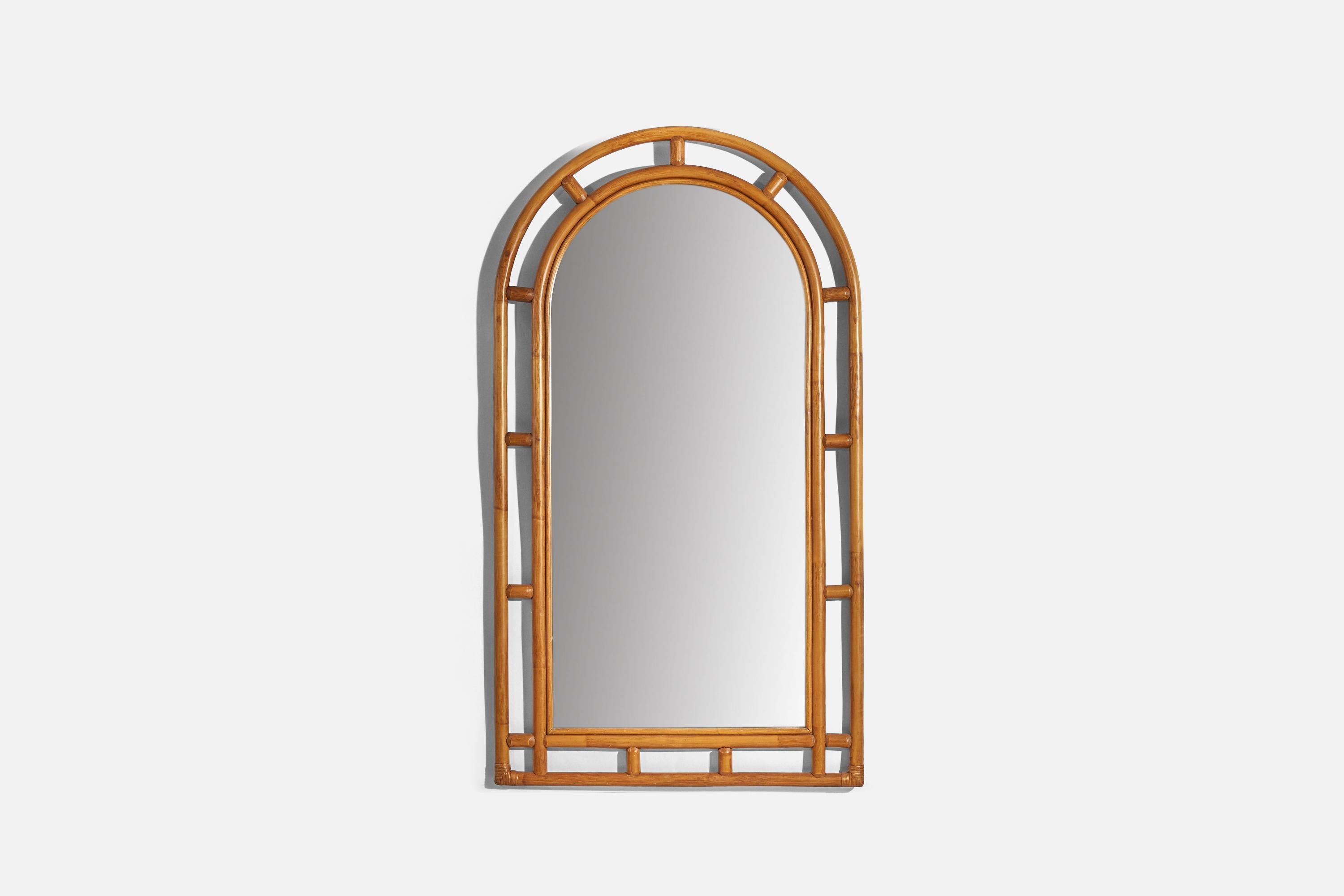 A bamboo wall mirror designed and produced in Italy, 1950s.
   