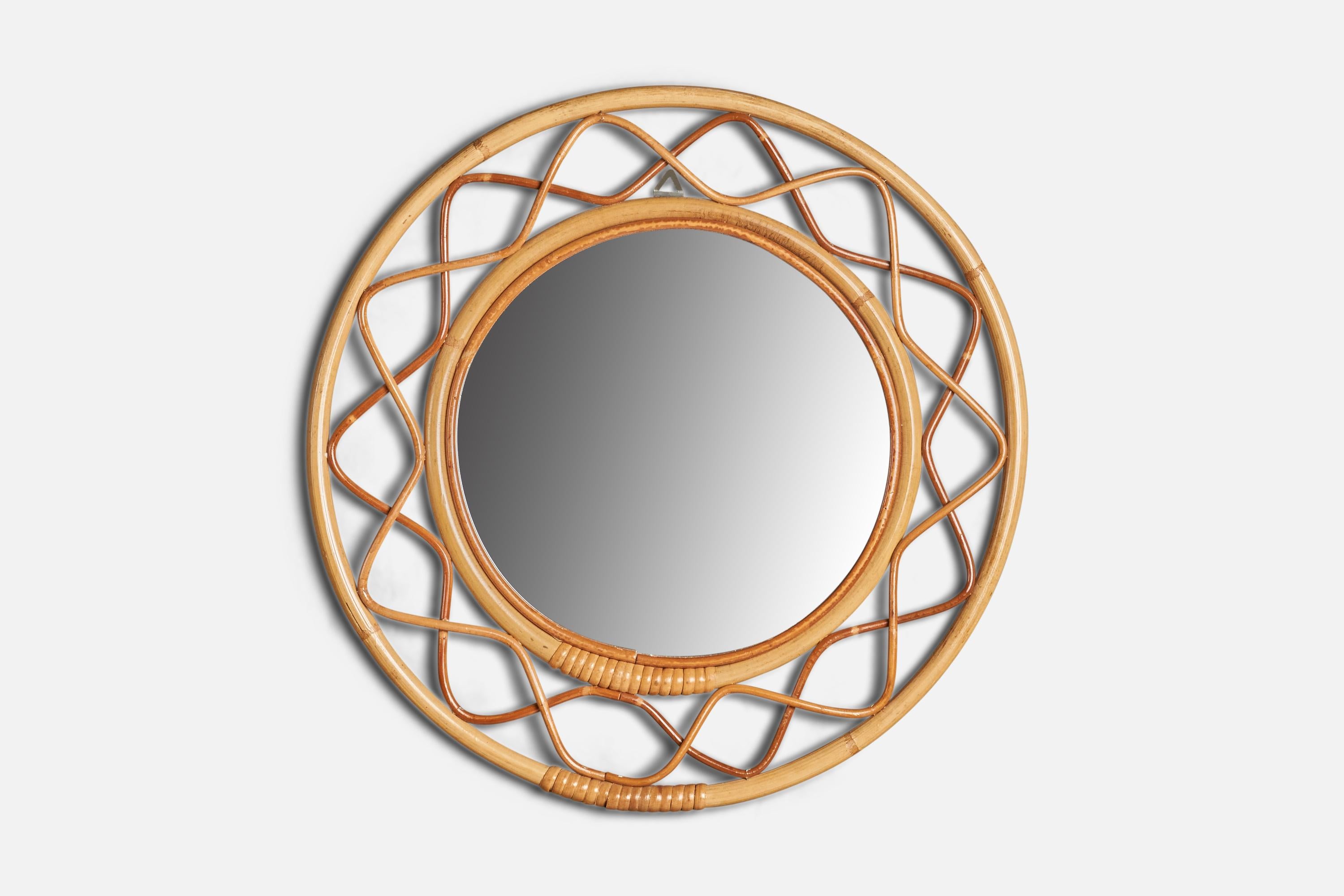 A moulded bamboo and rattan wall mirror, designed and produced in Italy, c. 1950s.
 