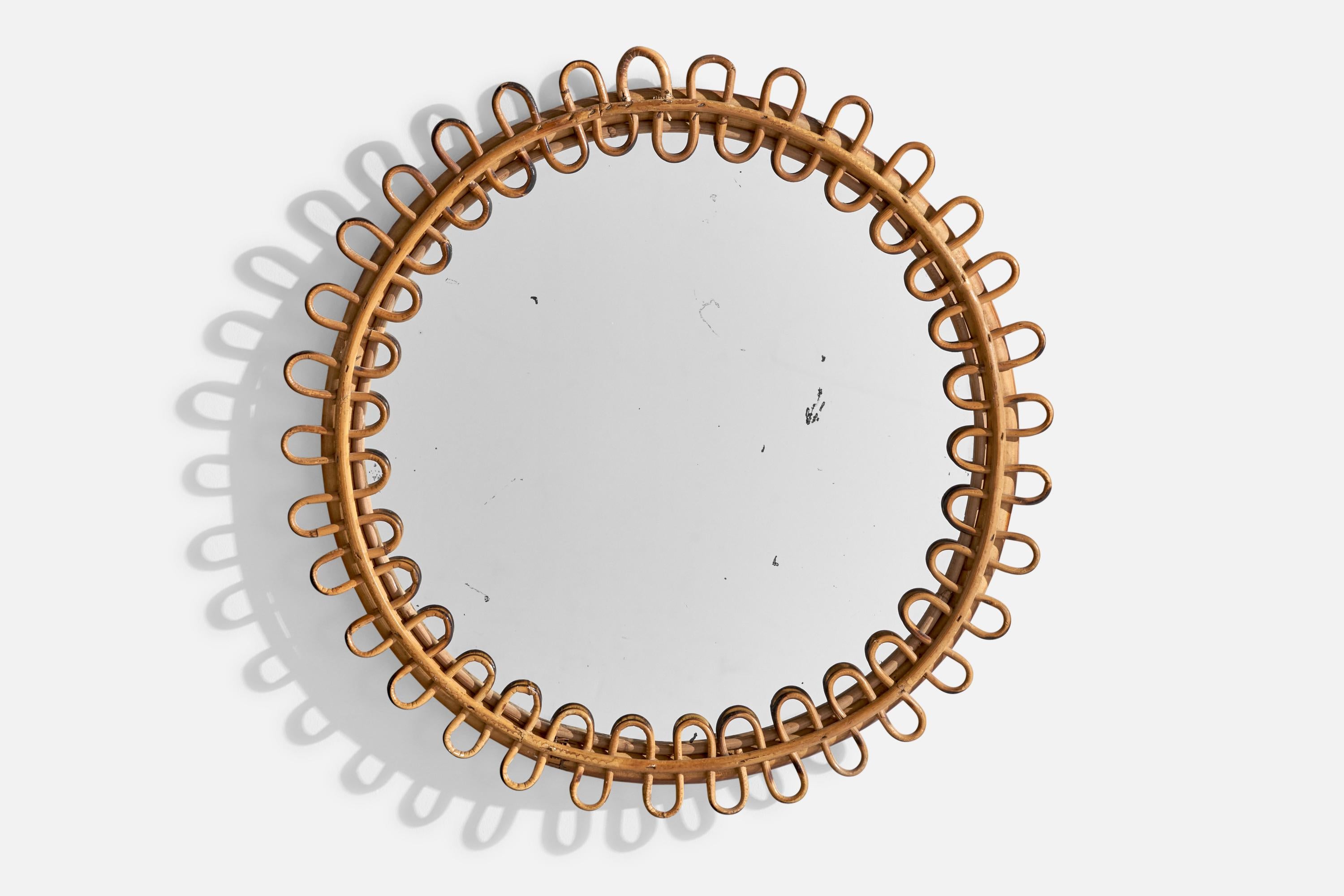 Espejo de pared de bambú y ratán fabricado en Italia, años 50.

Dimensiones del espejo (pulgadas): 19,125 