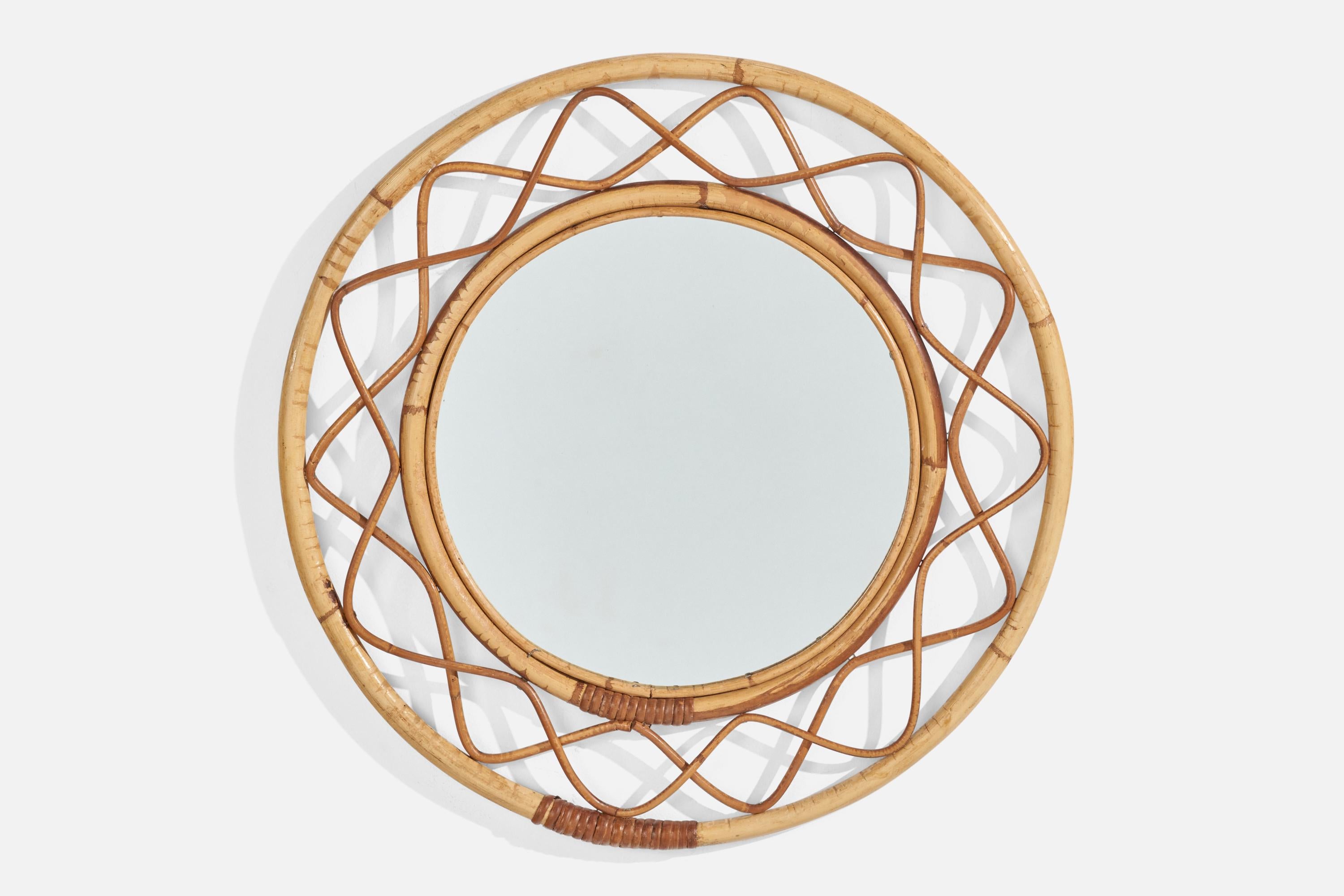 A bamboo and rattan wall mirror designed and produced by an Italian Designer, Italy, 1960s.