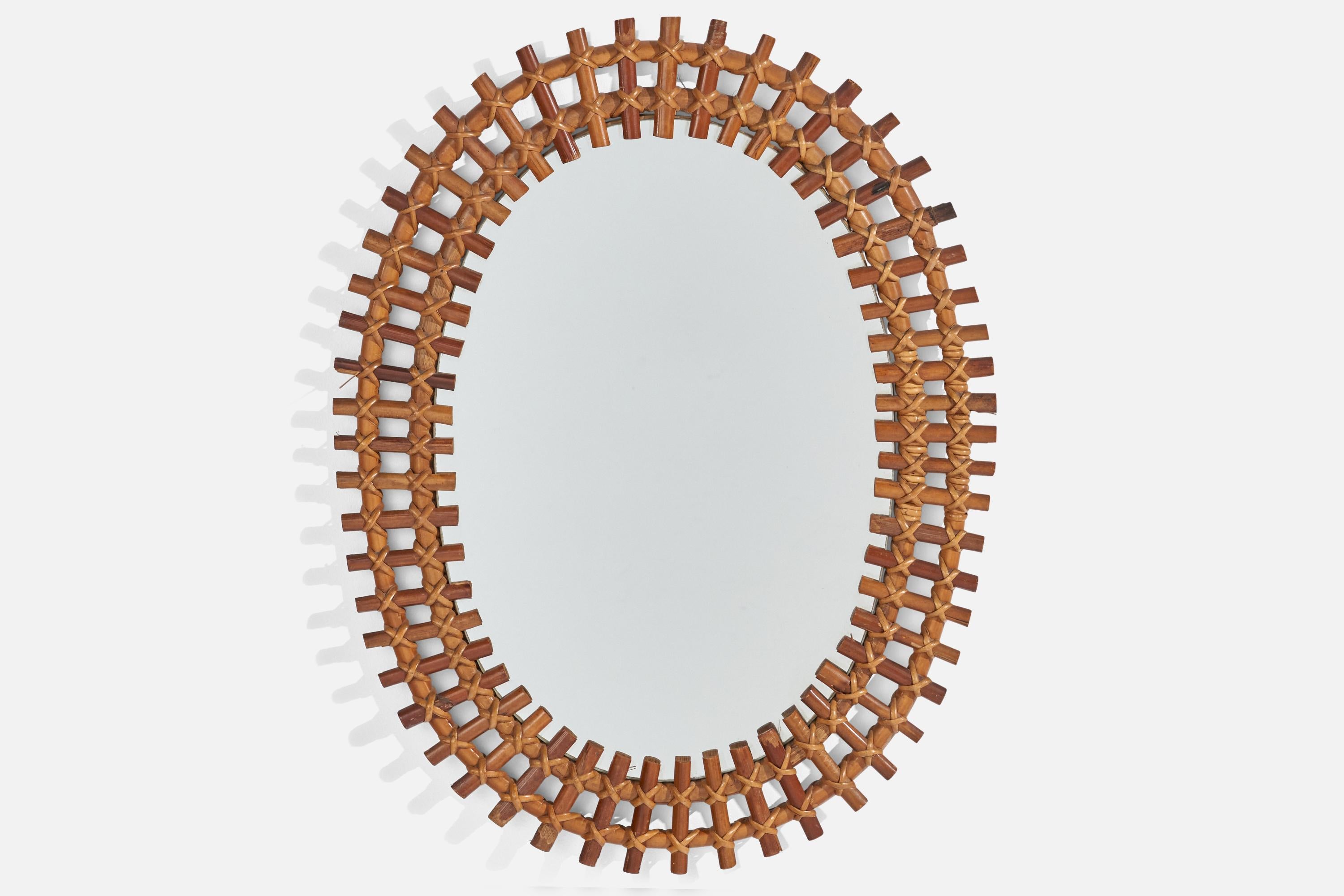 Espejo de pared de bambú y ratán diseñado y fabricado en Italia, c. 1960.