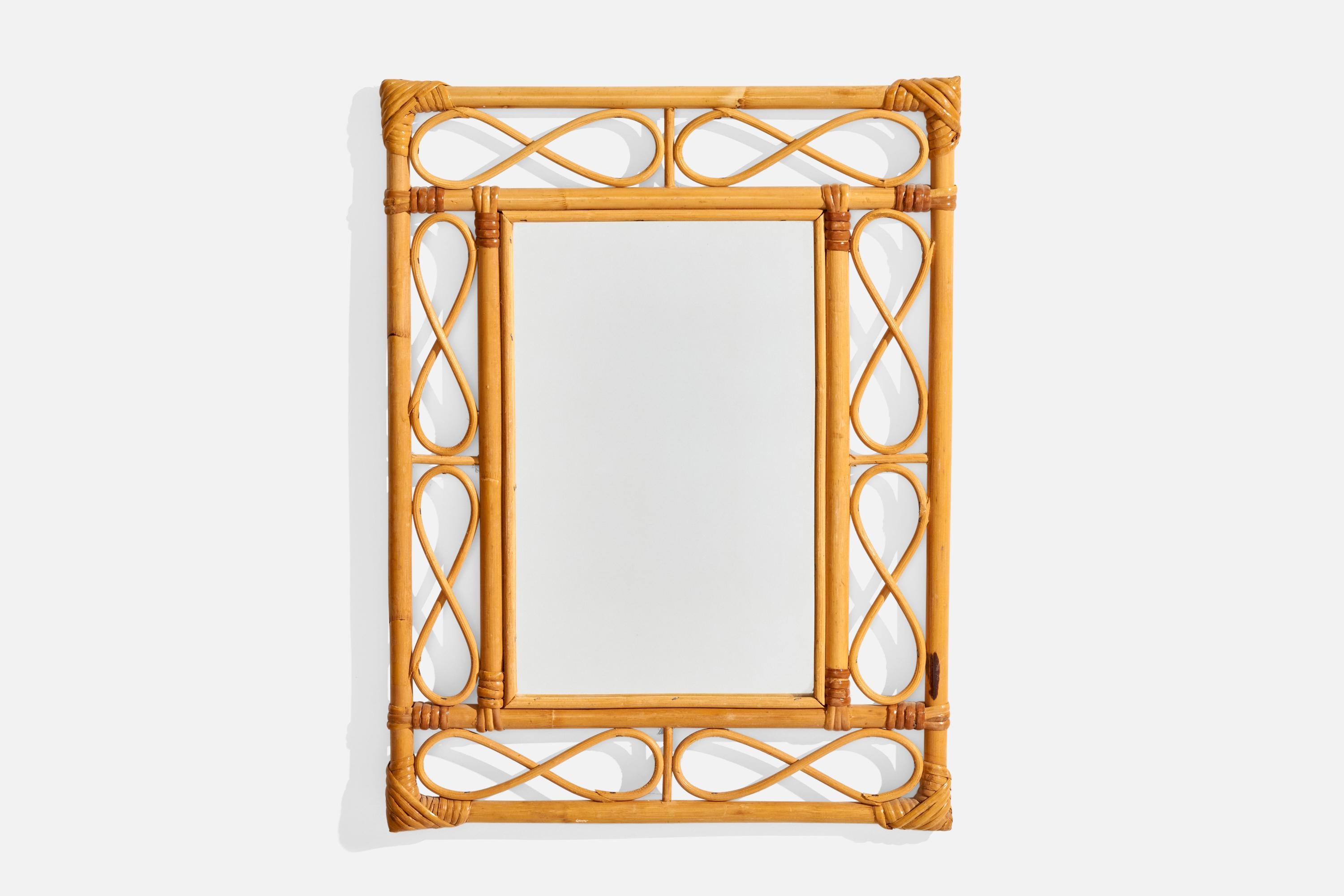 Miroir mural en bambou et rotin, conçu et produit en Italie, C.C., années 1960.

Dimensions globales (pouces) : 20.875